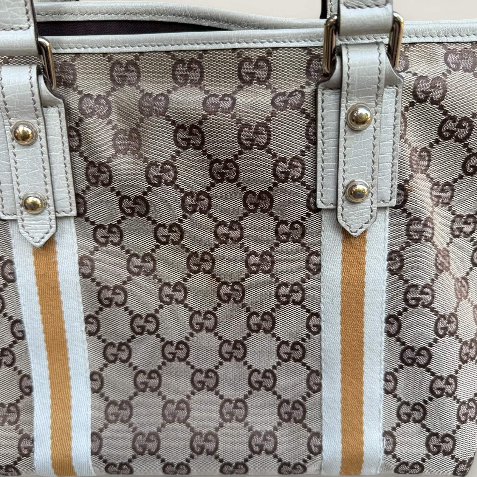 Achterkant originele Gucci tas vlekje