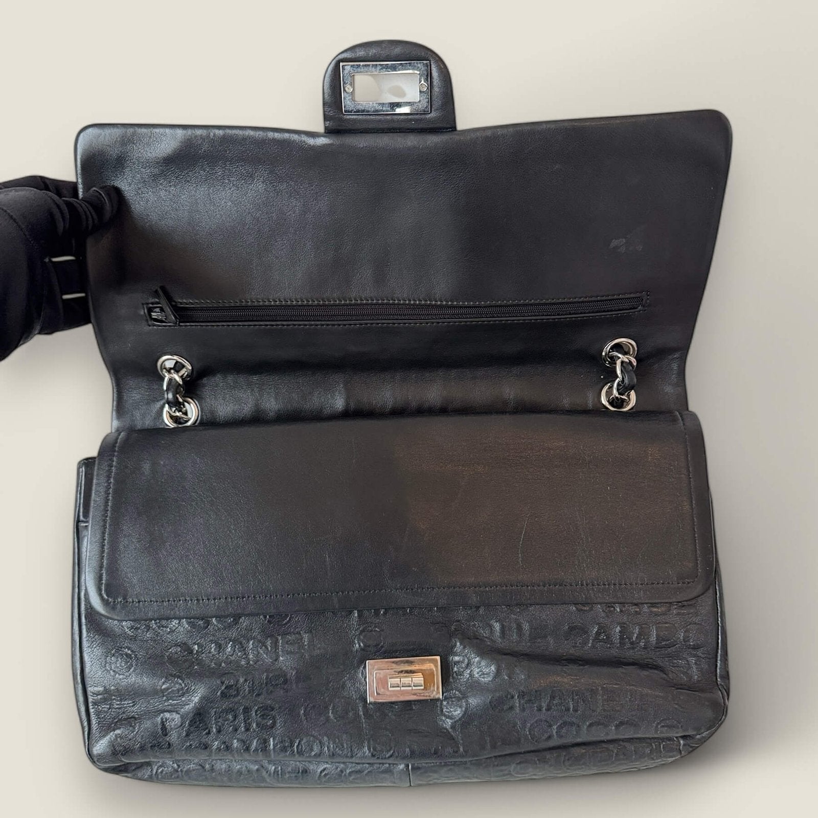 Inside 2.55 Chanel flap shoulder bag Rue Cambon print