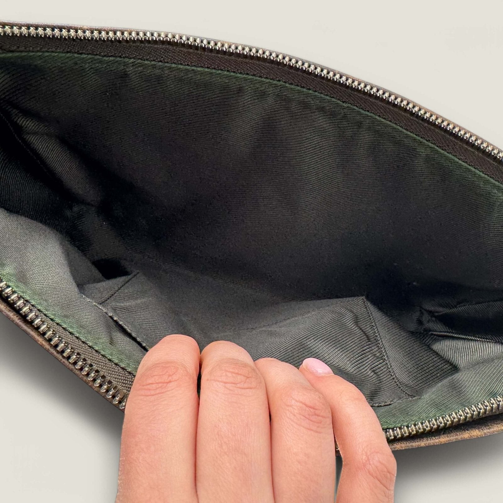 Interior Gucci clutch