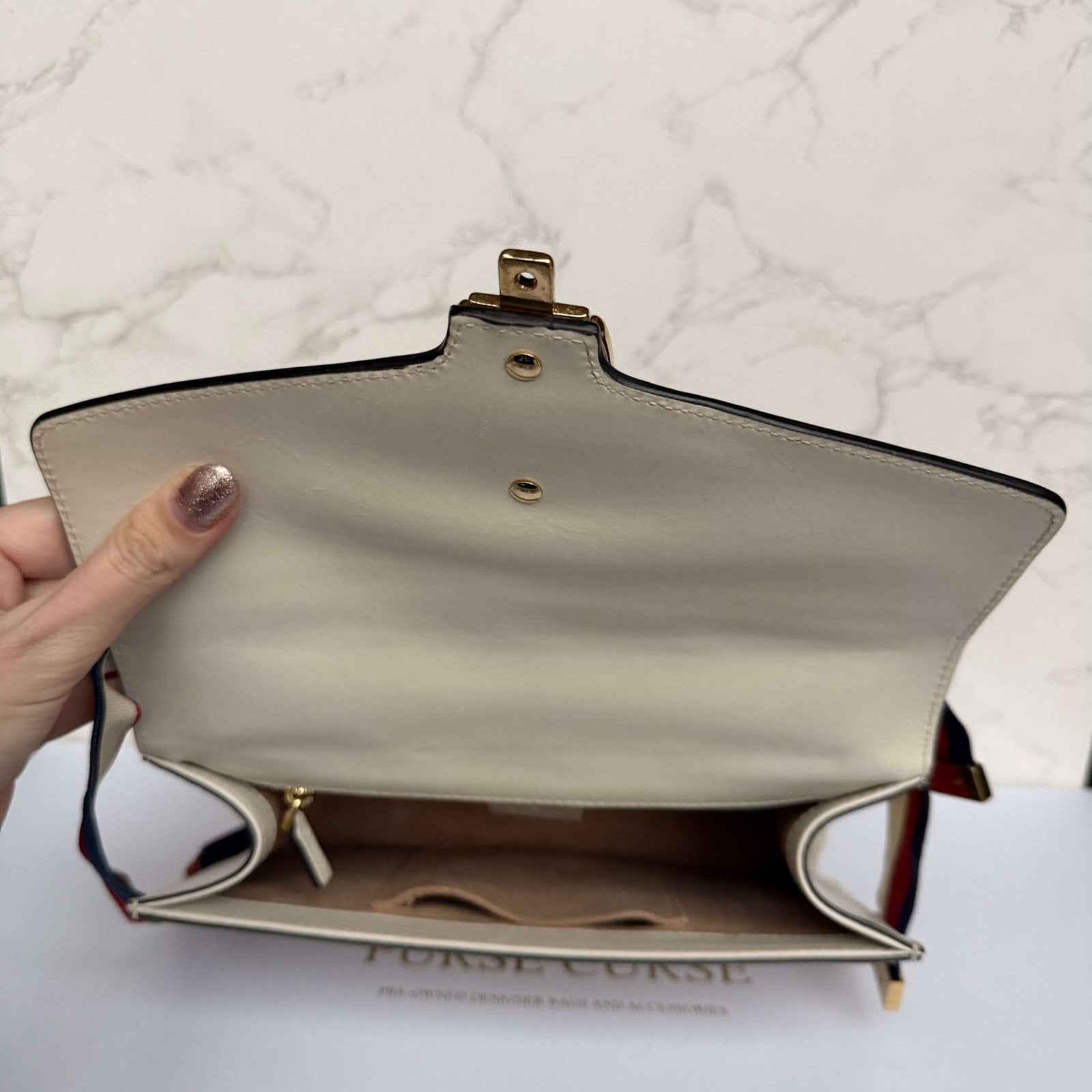Binnenkant authentieke Gucci tas tweedehands