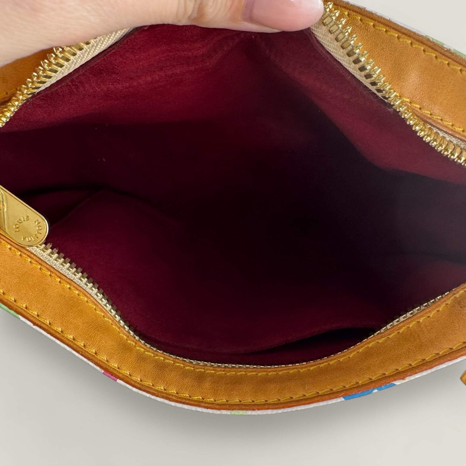 Inside vintage Louis Vuitton bag