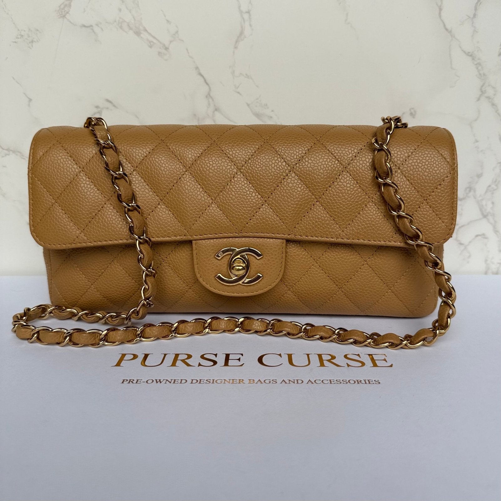 Chanel East West flap beige caviar