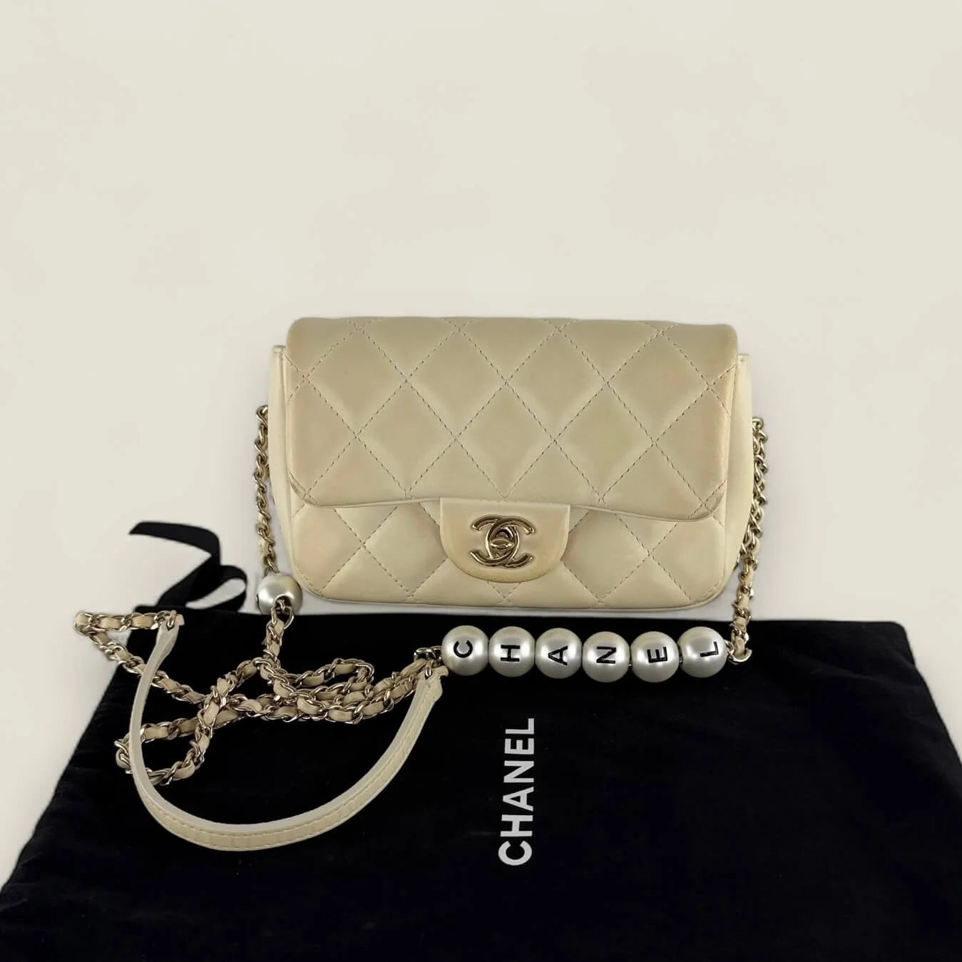Chanel Mini Flap with pearl chain pre-owned front