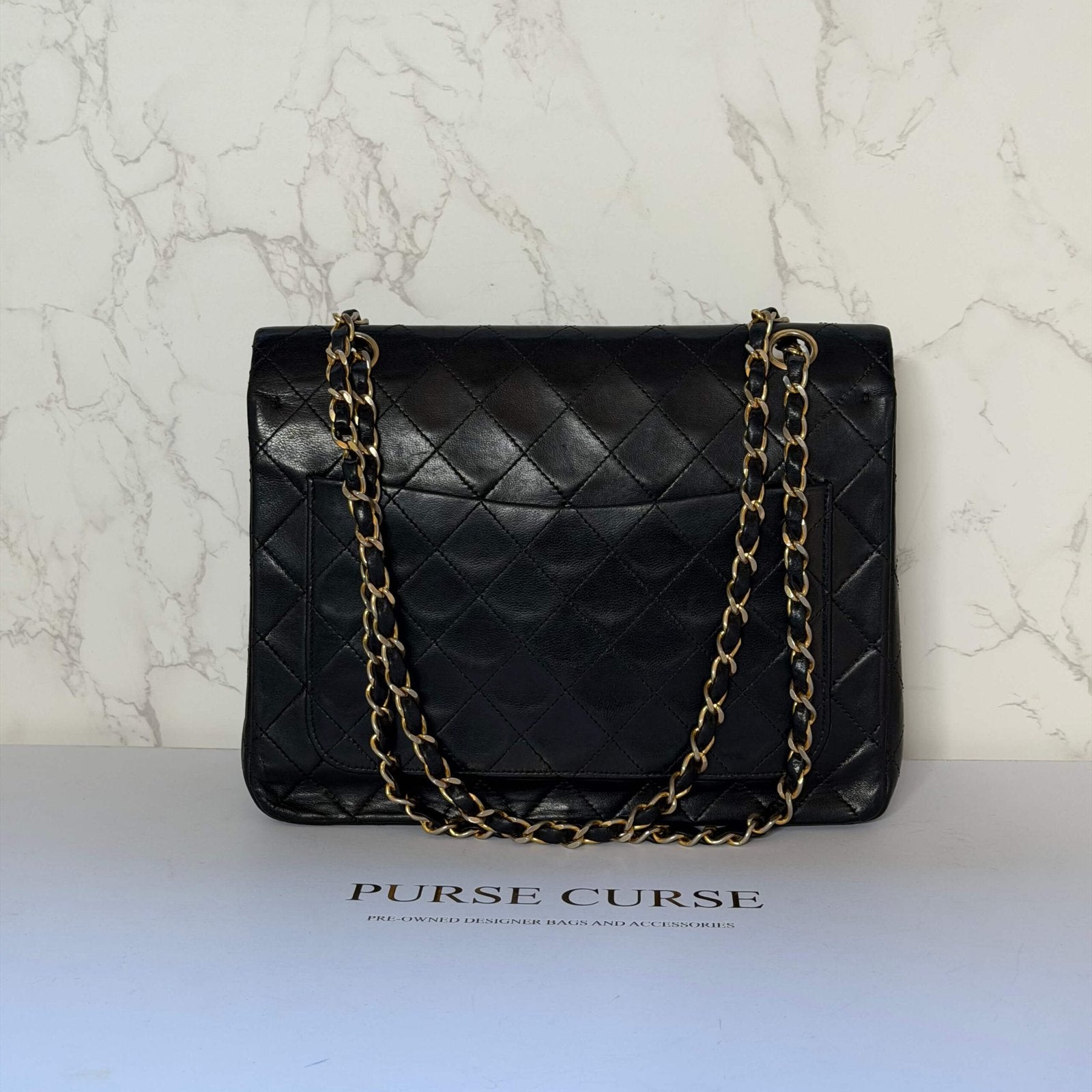 Chanel “Mona Lisa” back pocket (rear pocket detail)