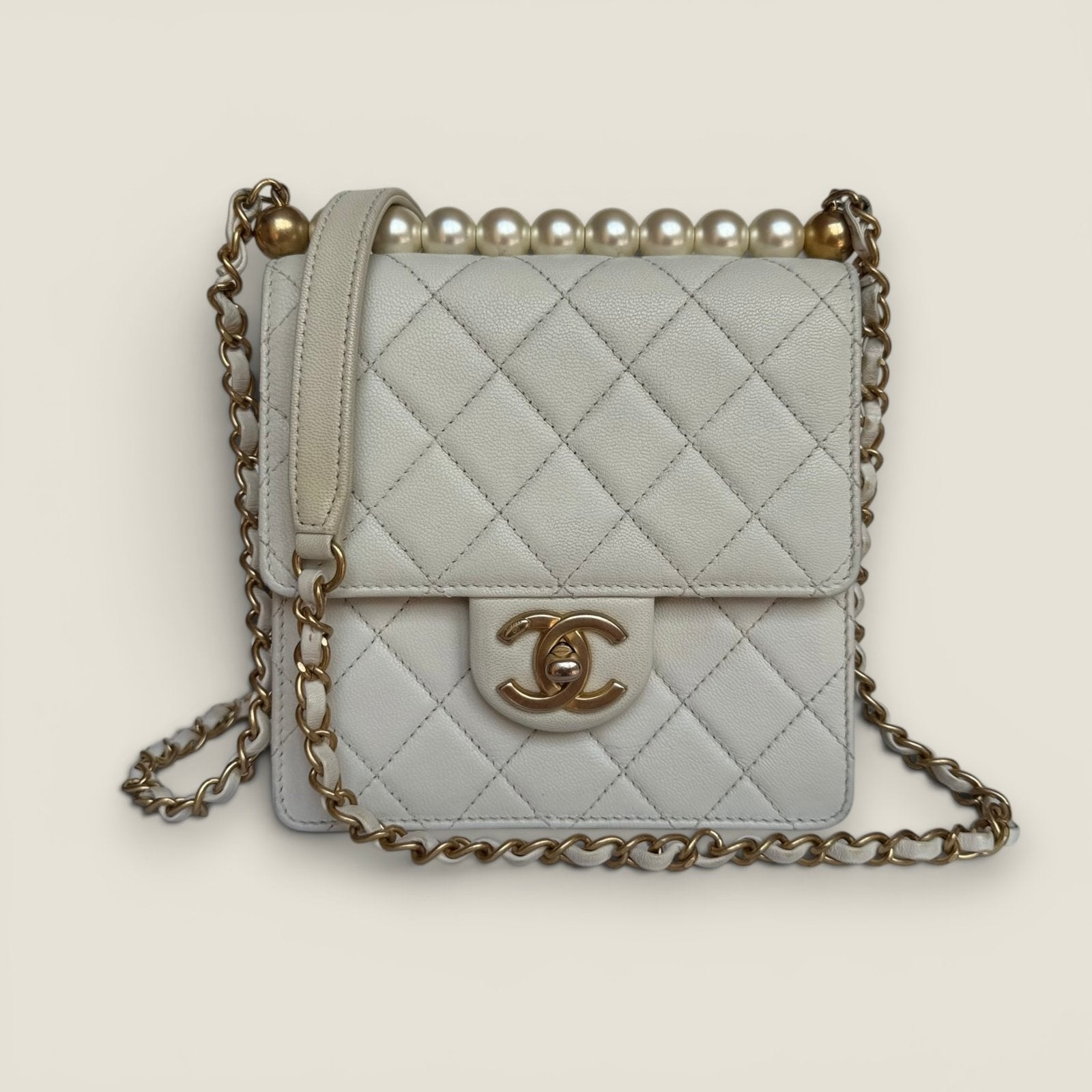 Chanel chic pearl flap bag
