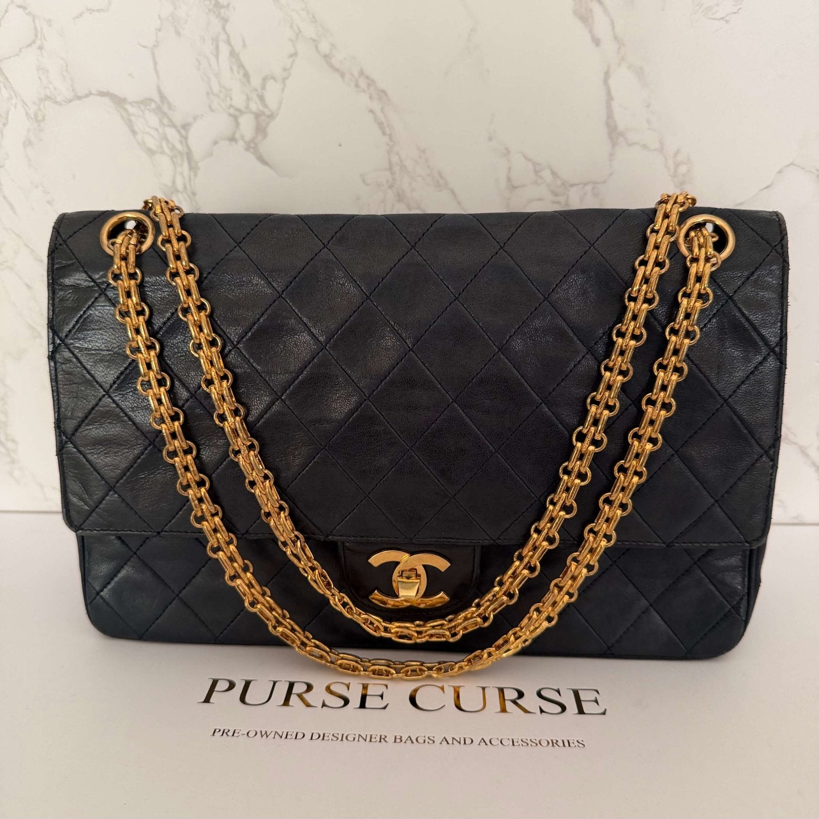 Chanel double flap medium vintage hoekslijtage detail