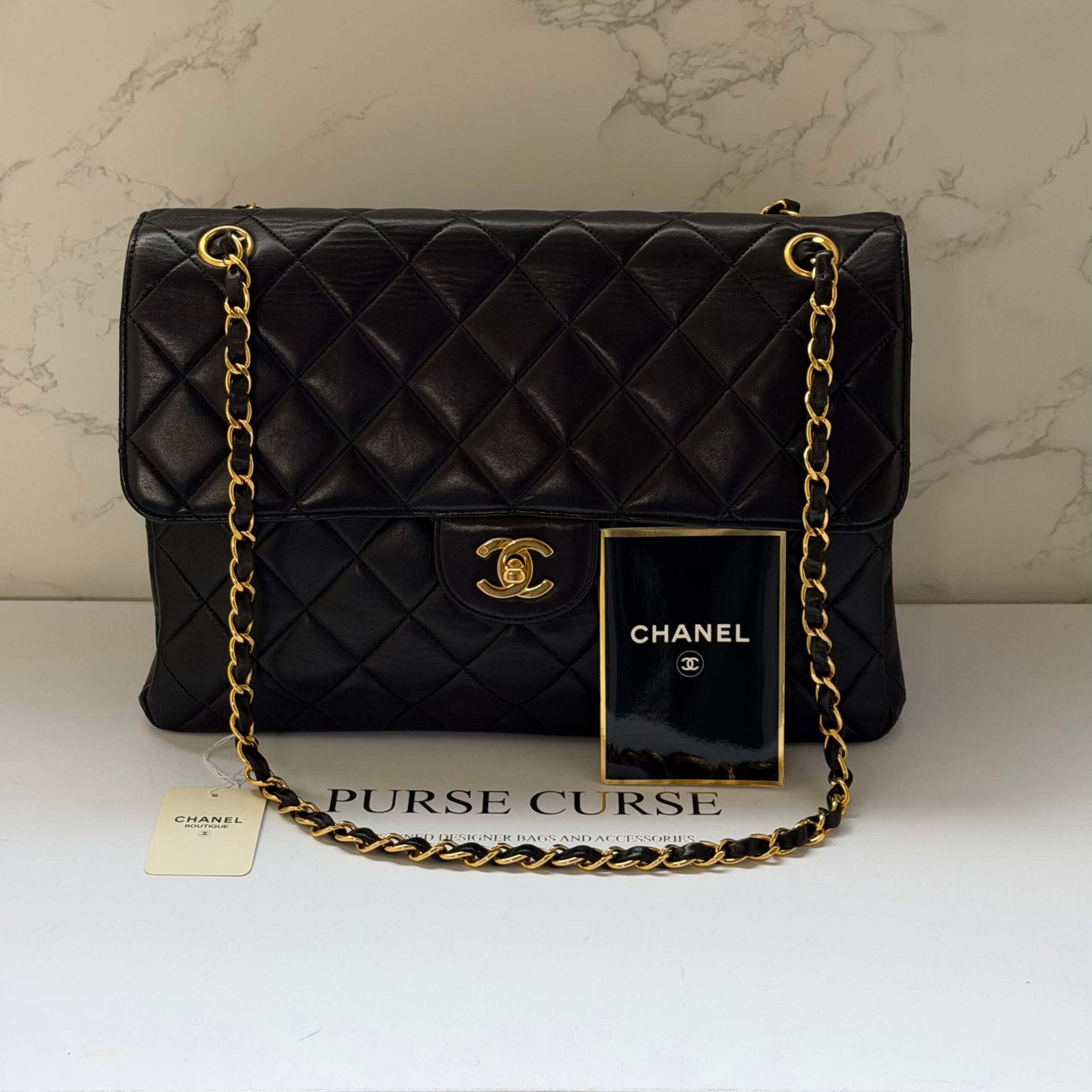 Chanel double sided flap bag back black Chanel<br>
