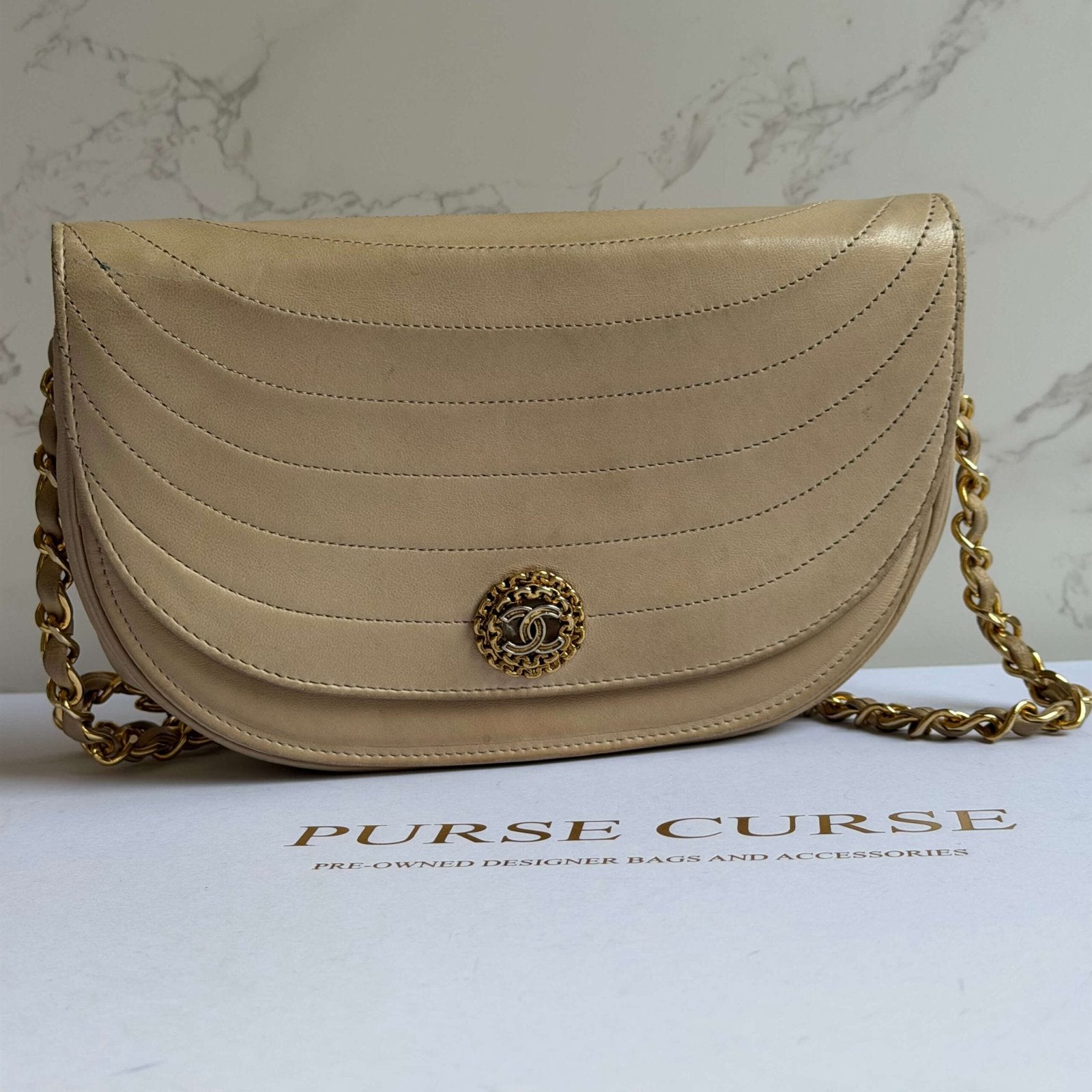 Chanel half moon flap bag beige lambskin leather