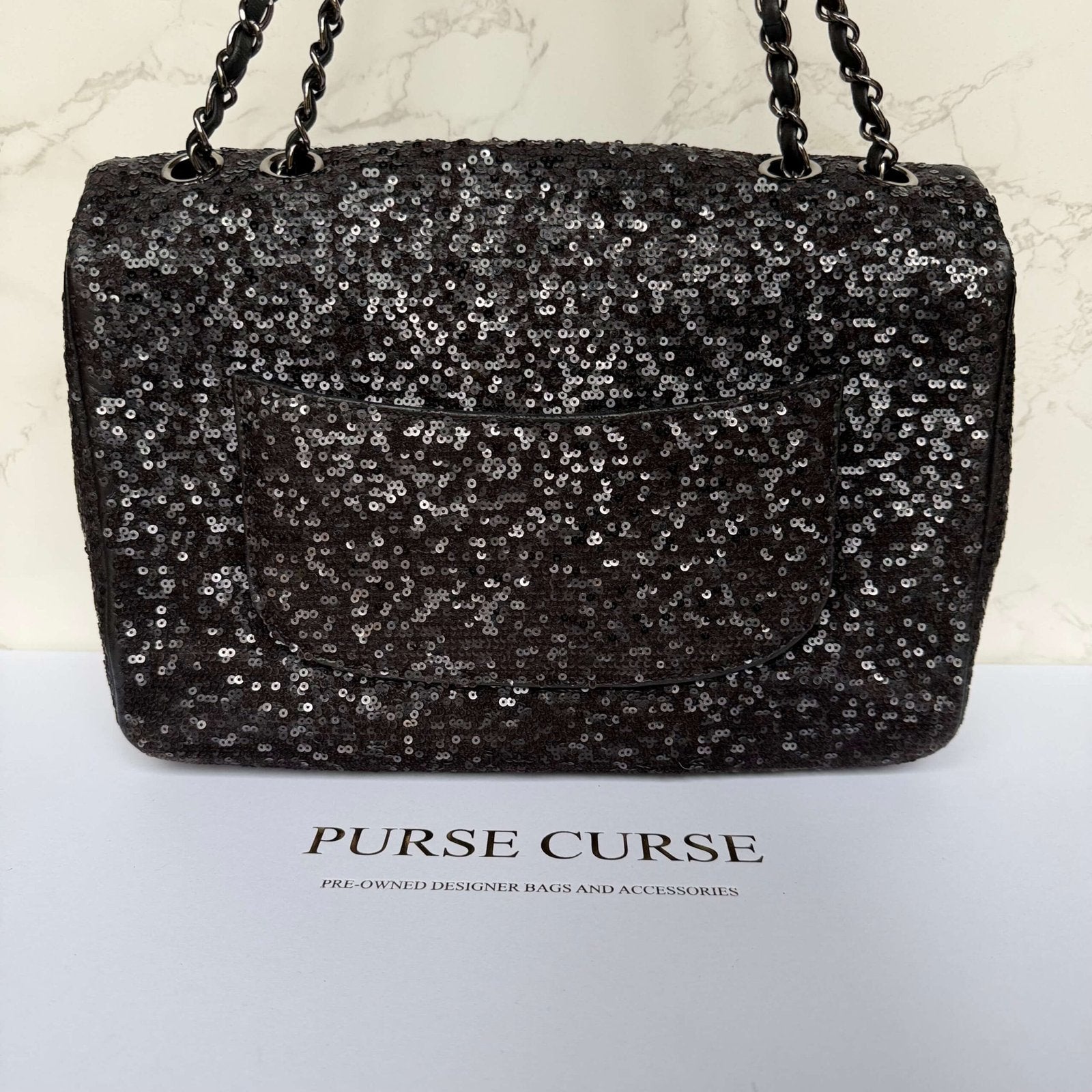 Chanel jumbo achterkant tas