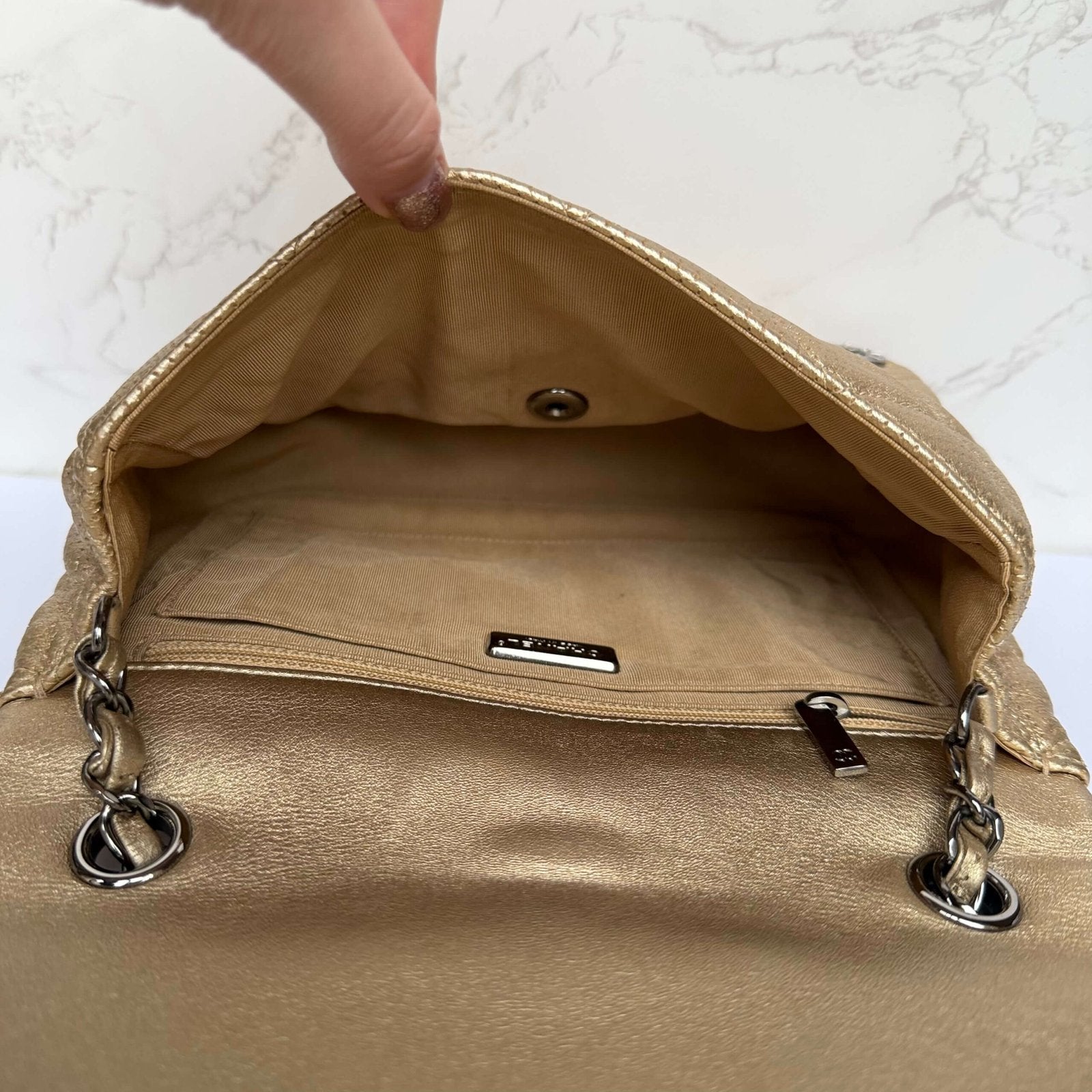Chanel rare gold designer bag