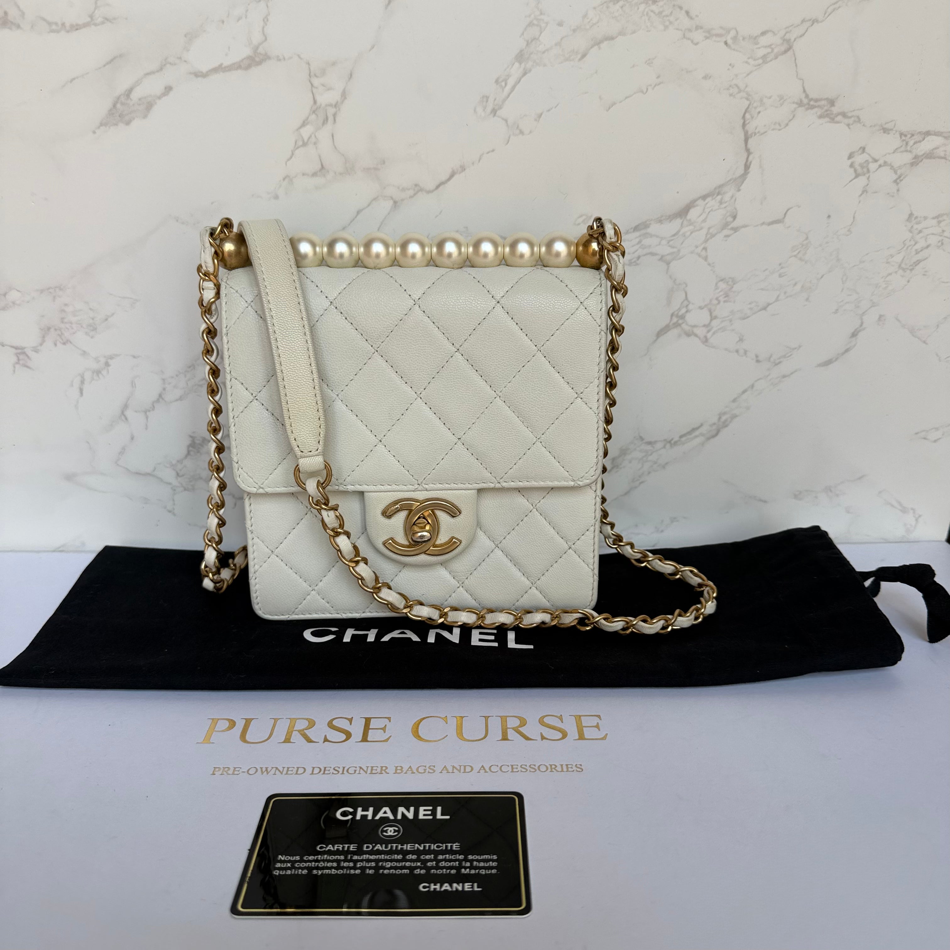 Chanel chic pearl flap bag