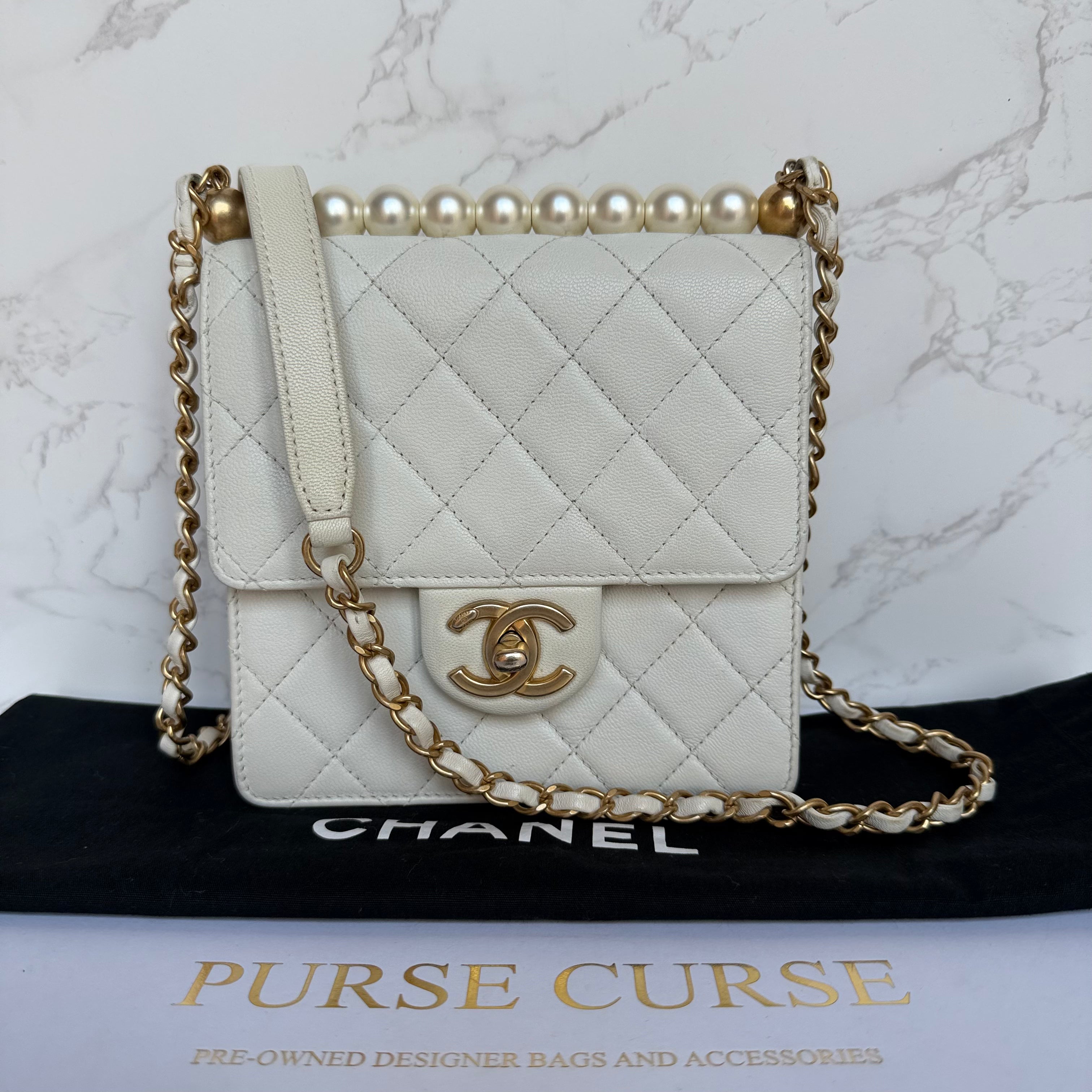 Chanel chic pearl flap bag