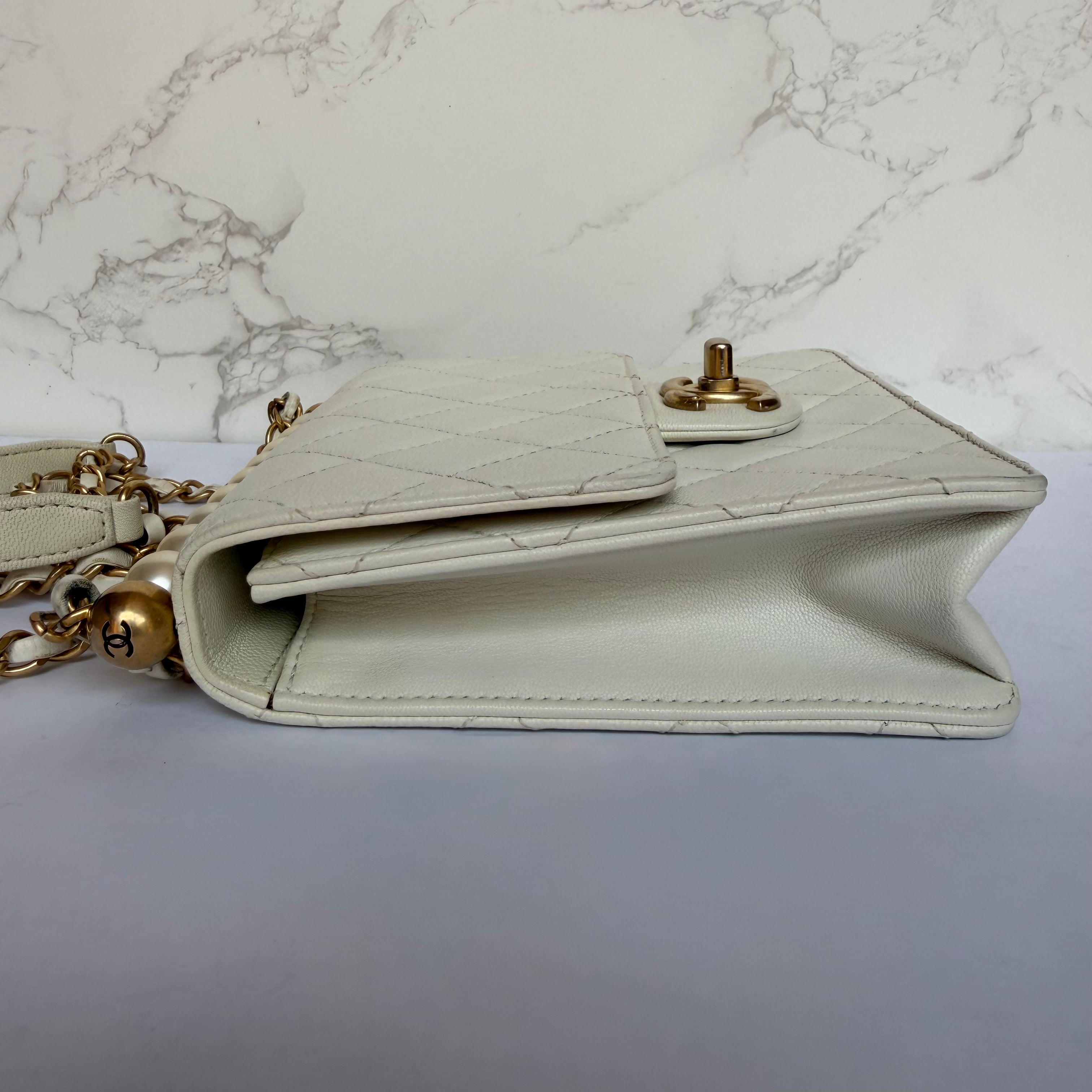 Chanel chic pearl flap bag