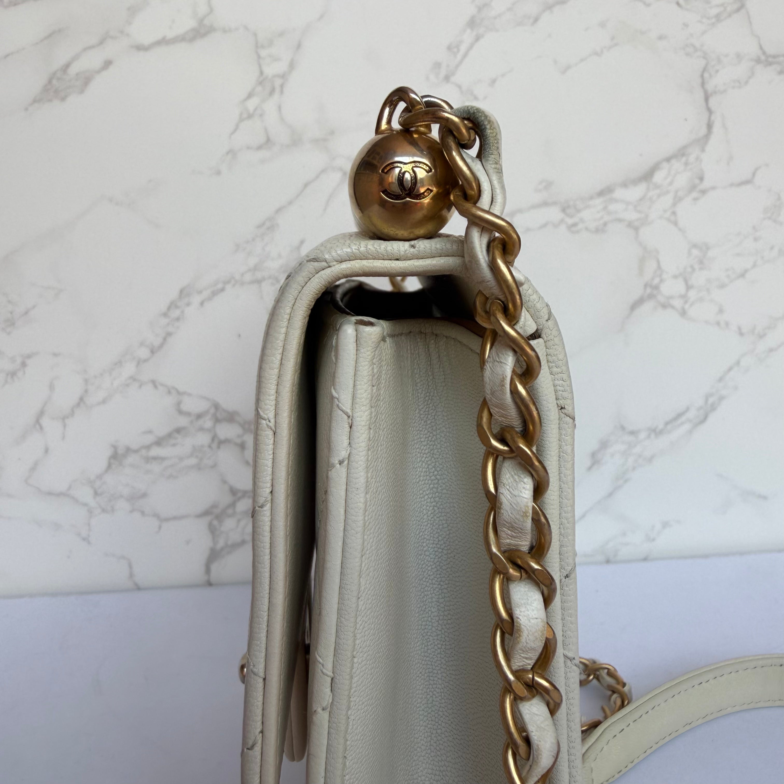 Chanel chic pearl flap bag