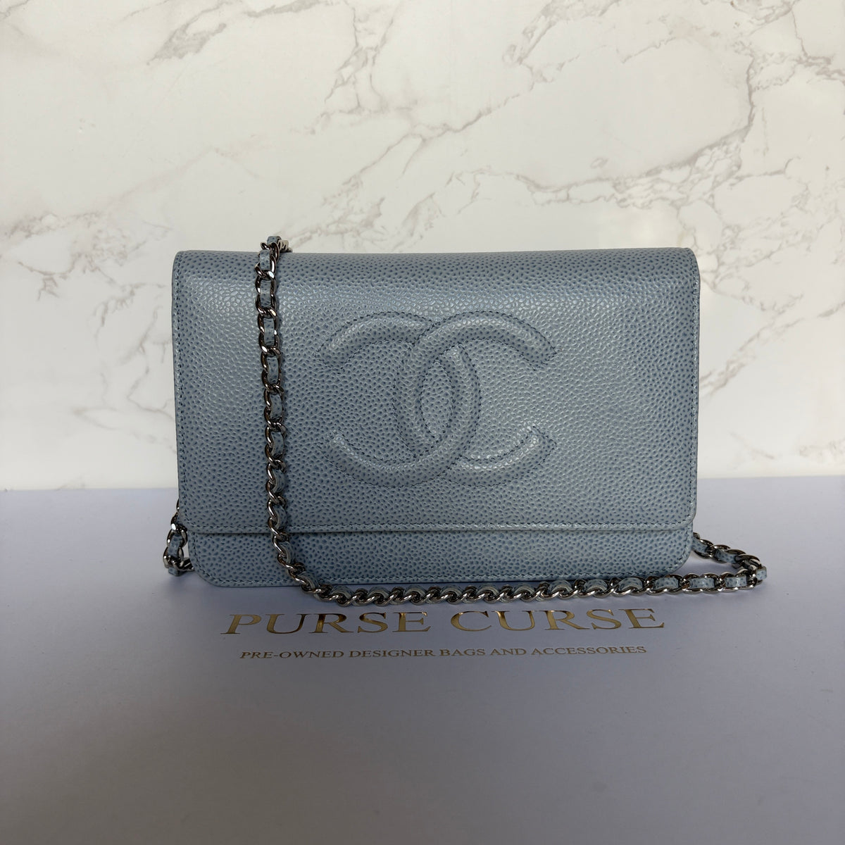 Chanel timeless WOC lichtblauw caviar leer