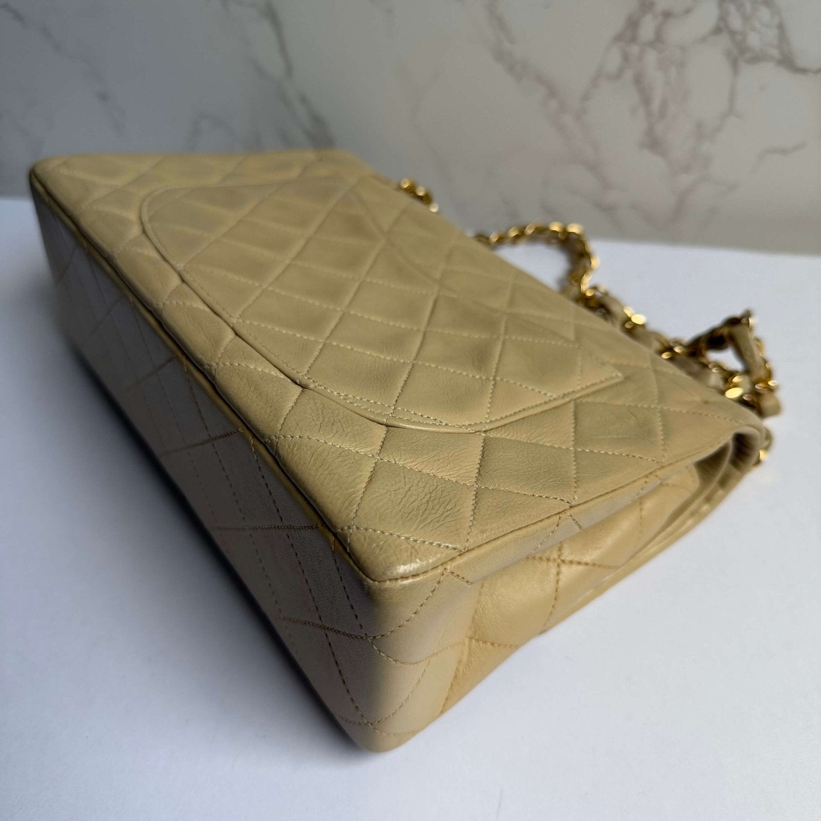 Signs of wear authentic vintage Chanel small classic flap