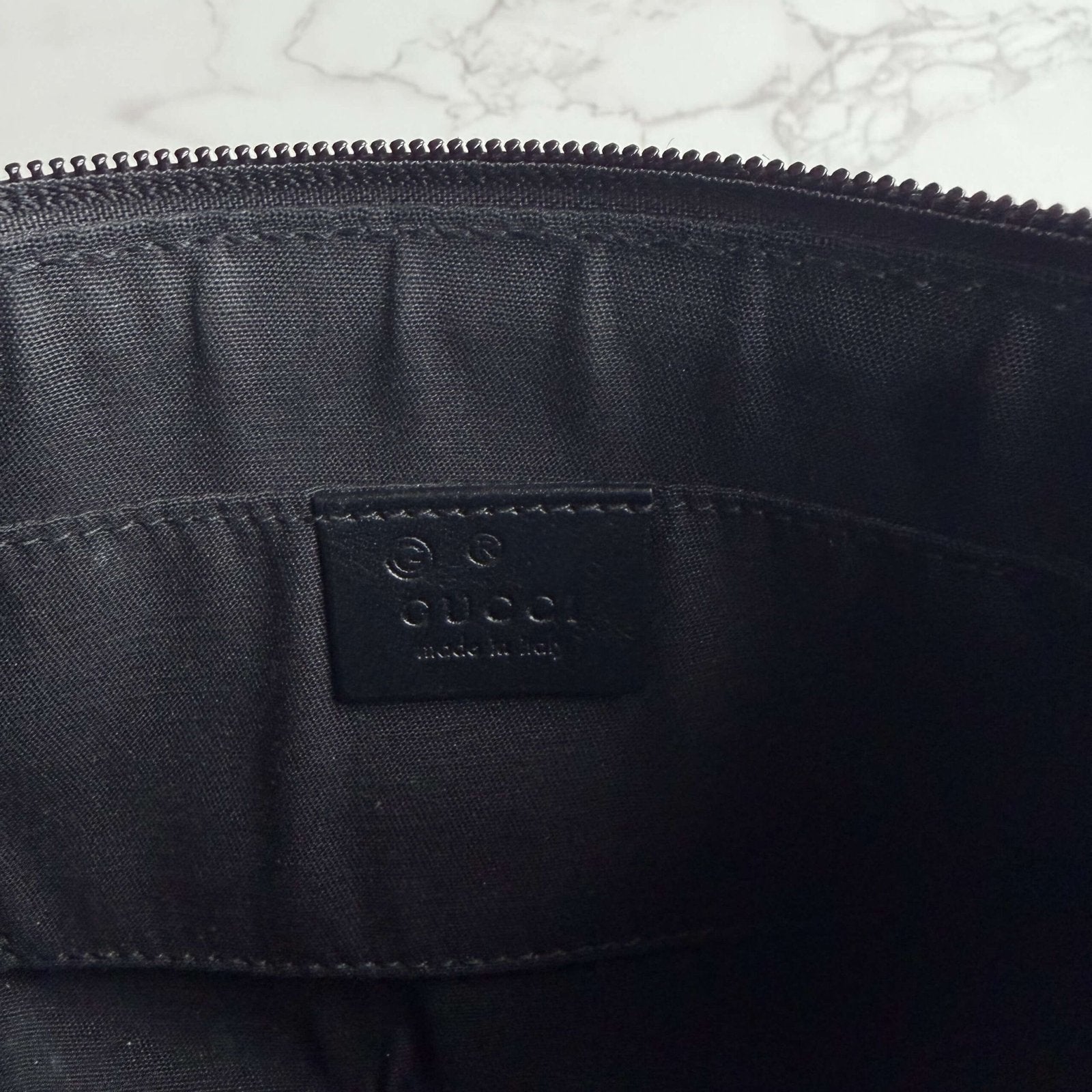 Gucci mini schoudertas binnenkant
