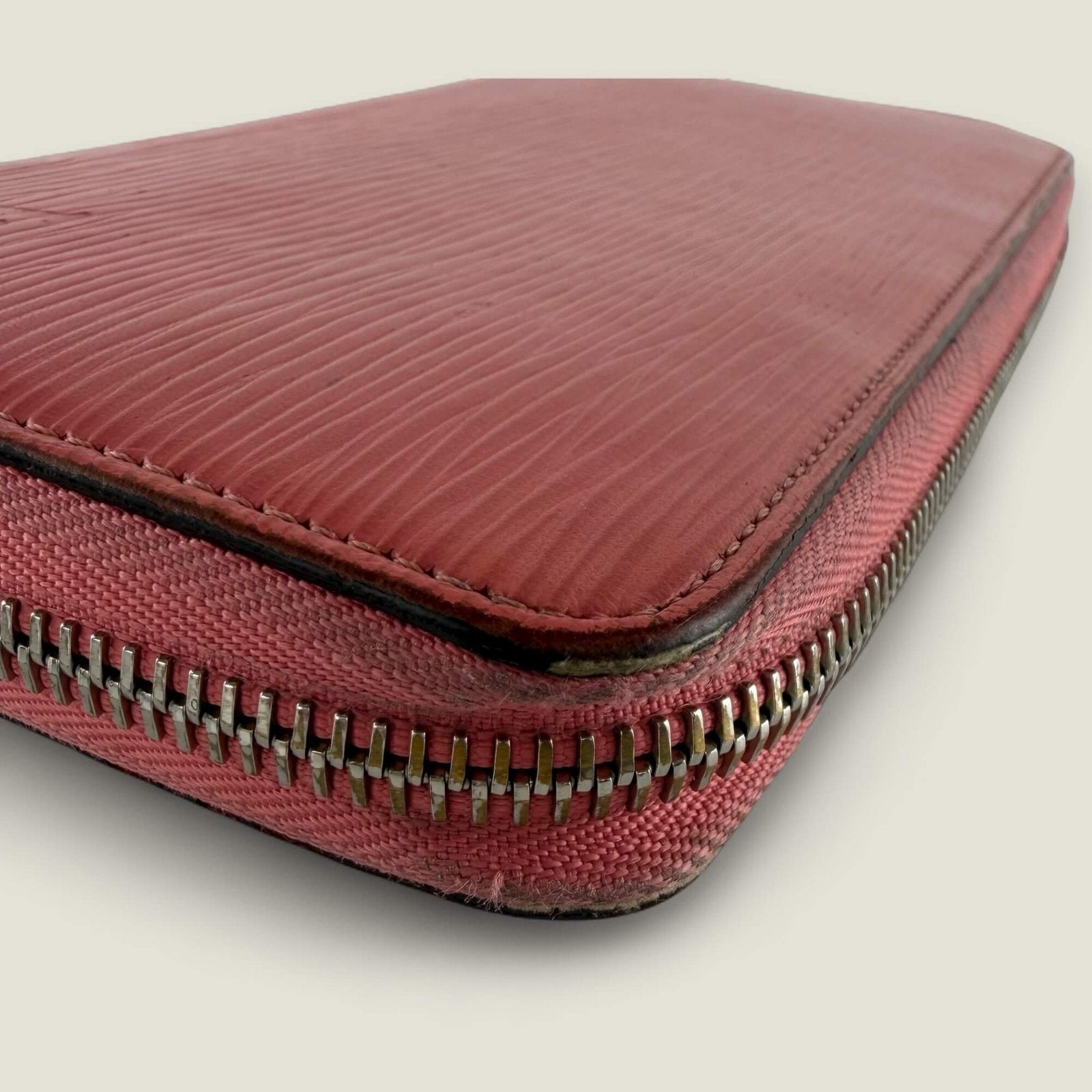 Hoekjes originele Louis Vuitton portemonnee roze