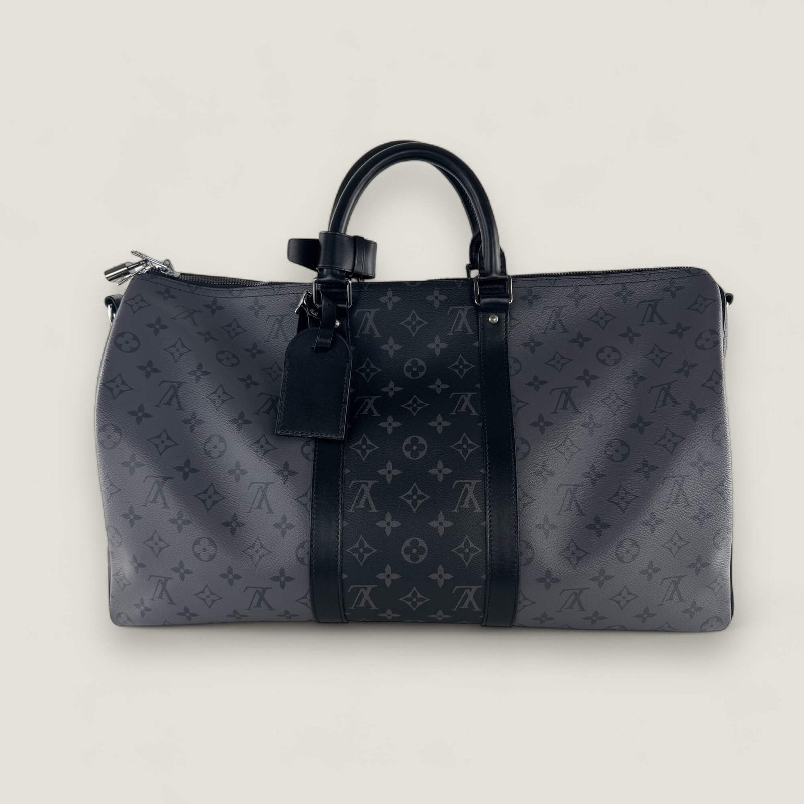 Louis Vuitton Keepall Bandoulière 50 front in grey monogram canvas