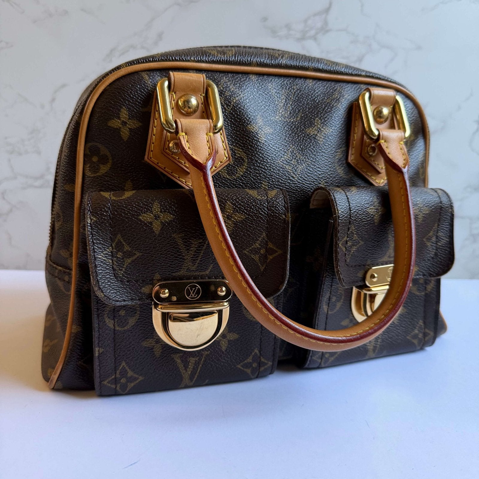Louis Vuitton Manhattan PM designer bag