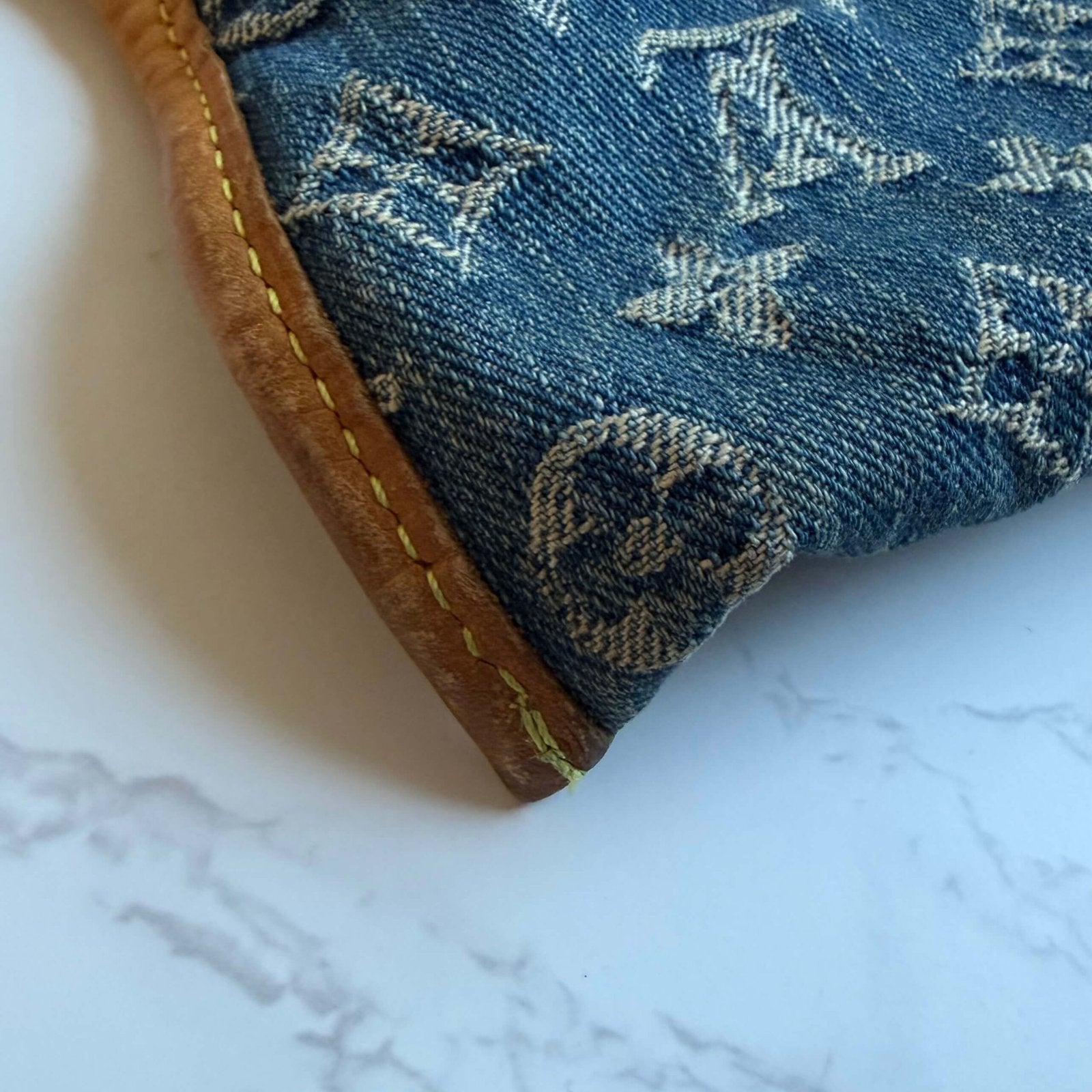 Louis Vuitton sac plat zijkant