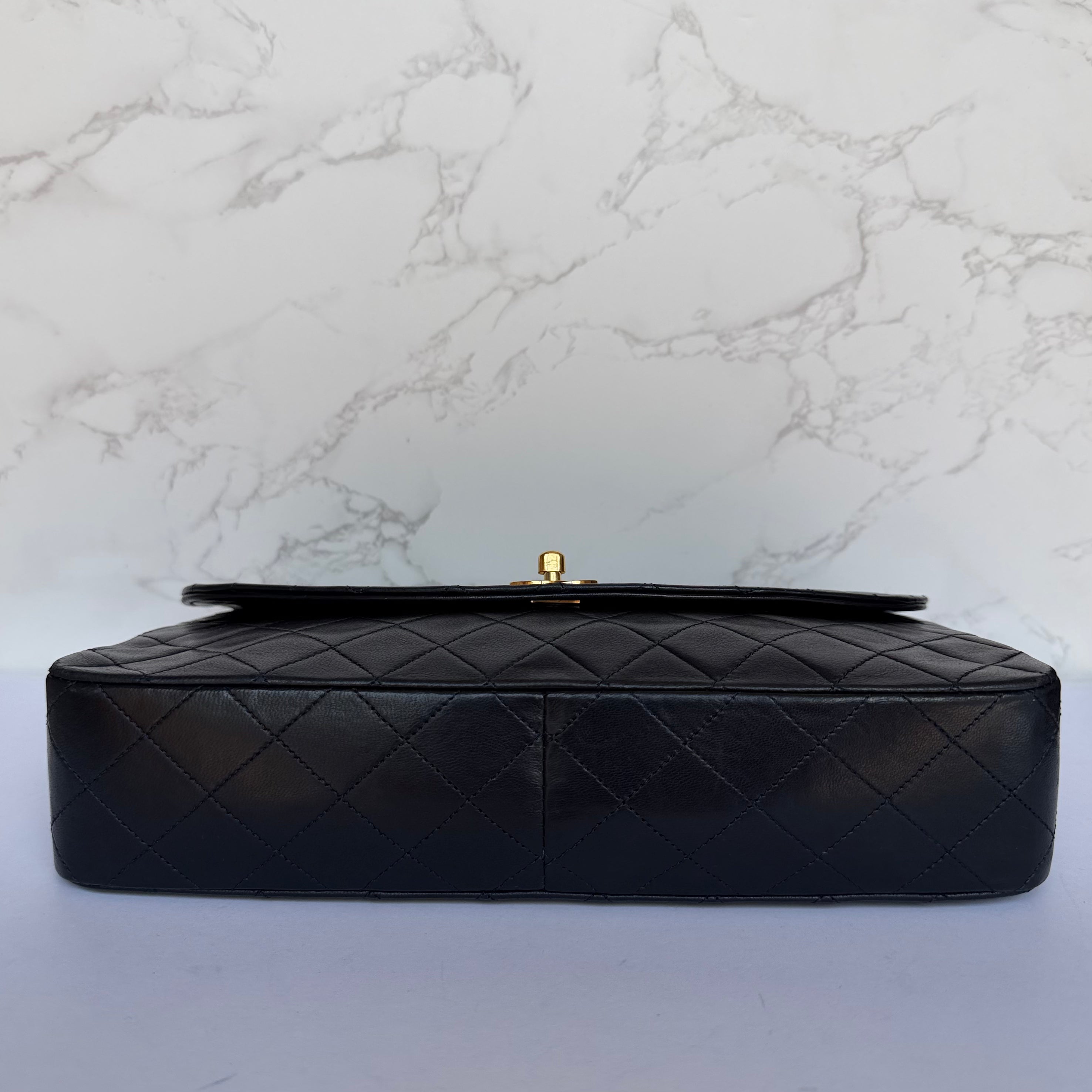 Bottom of vintage Chanel sky blue lambskin shoulder bag