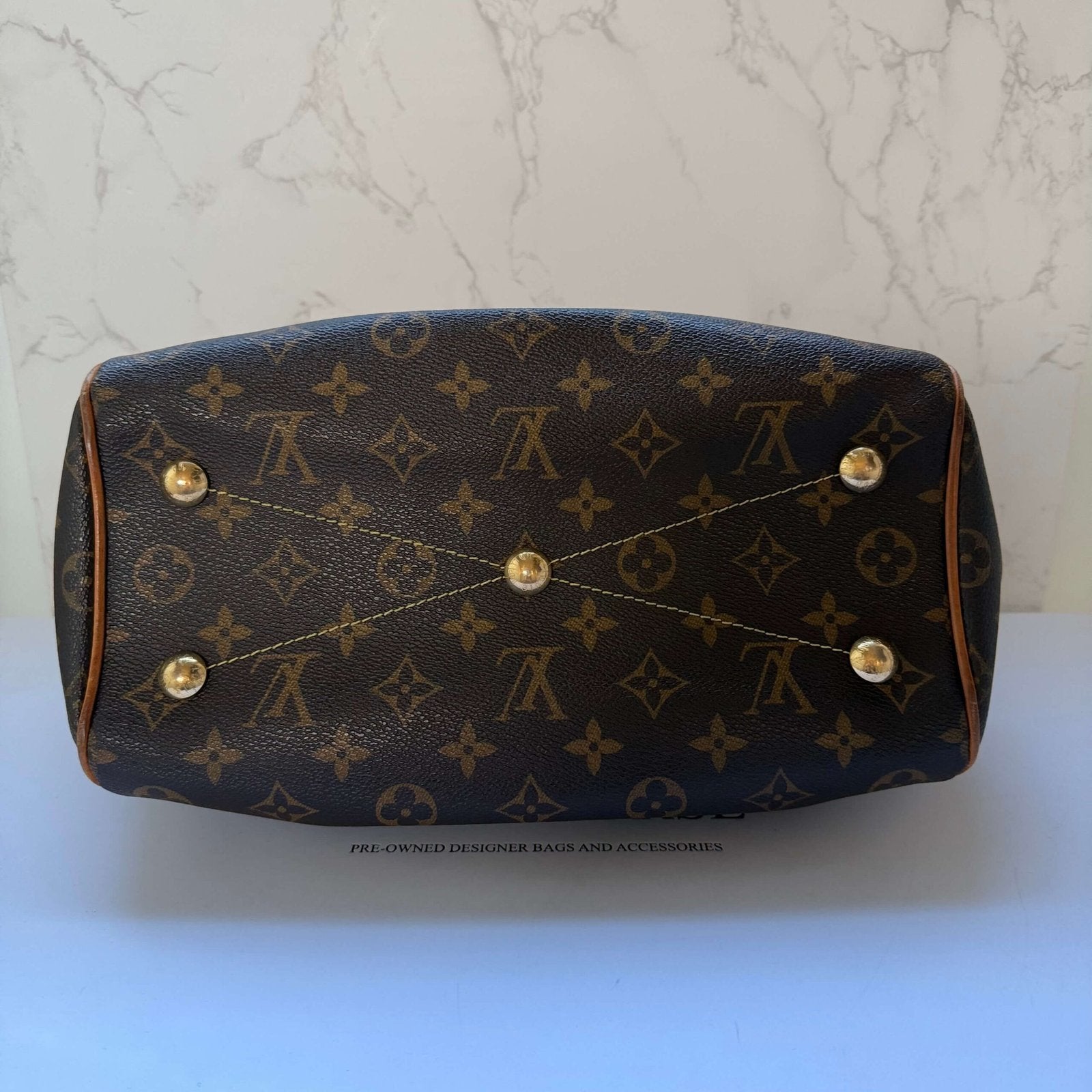 underside Monogram canvas Louis Vuitton Tivoli PM