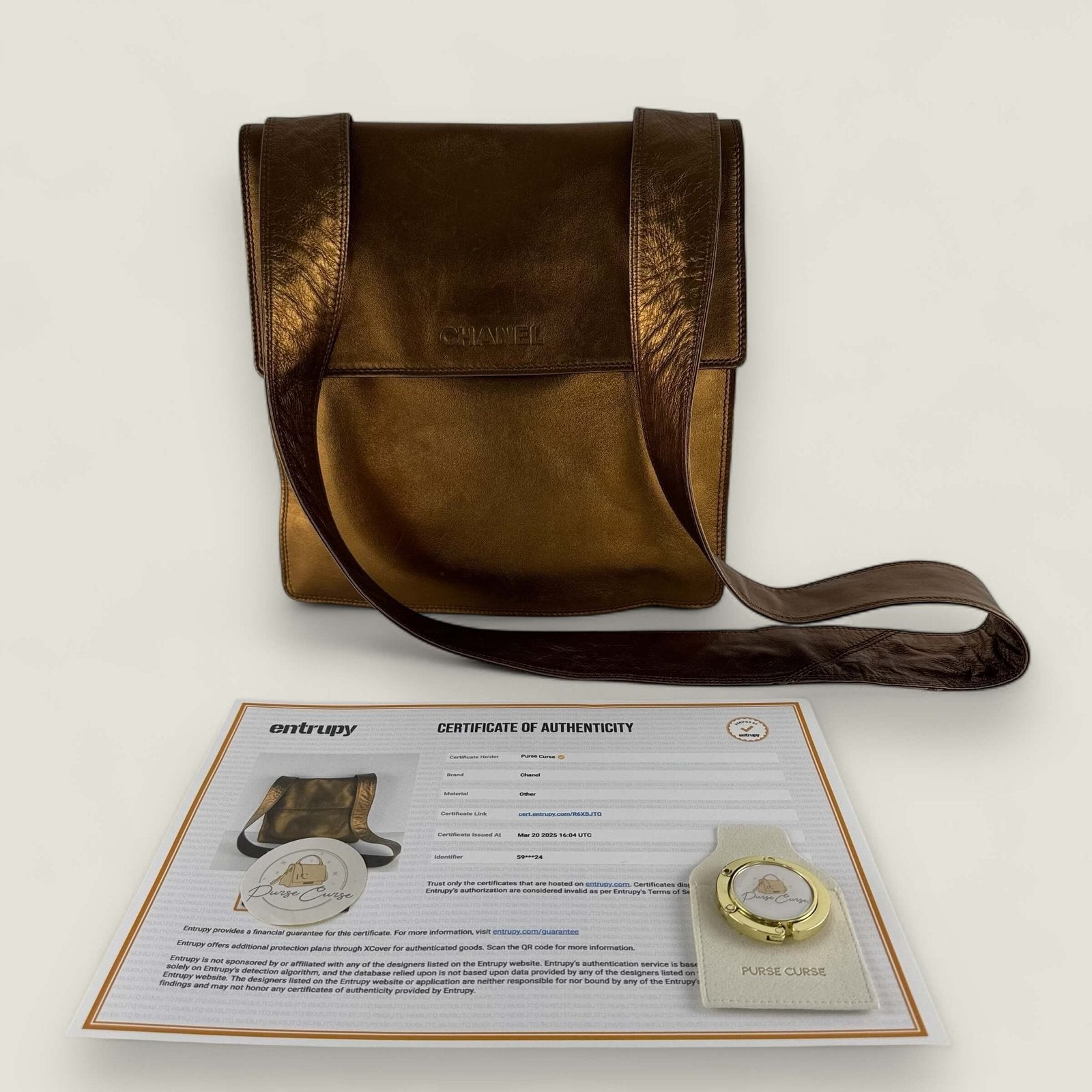 Pre-owned Chanel metallic gold shoulder bag Entrupy certificate