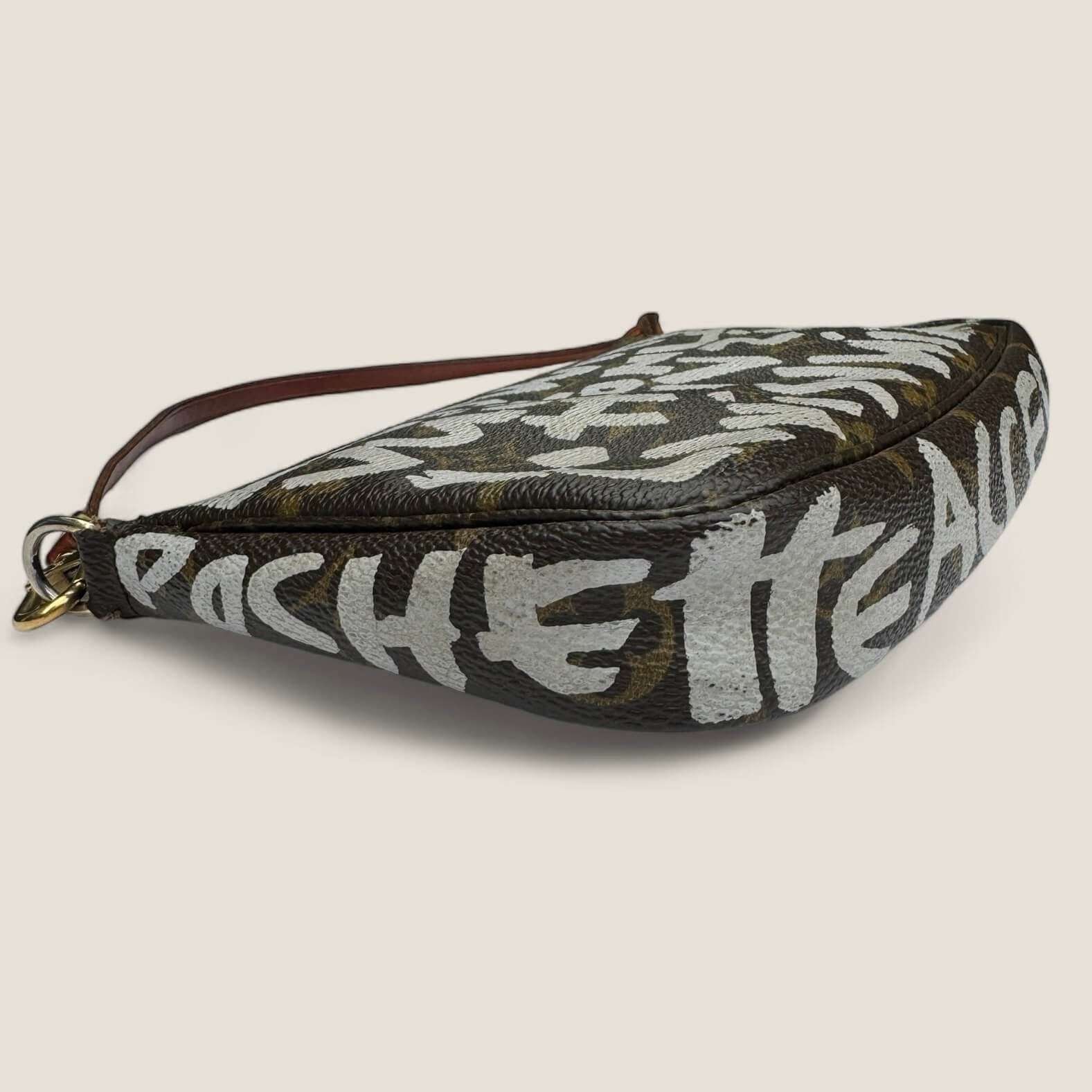 Pre-owned limited edition Louis Vuitton x Stephen Sprouse Graffiti Pochette Accessories from 2001 white letters