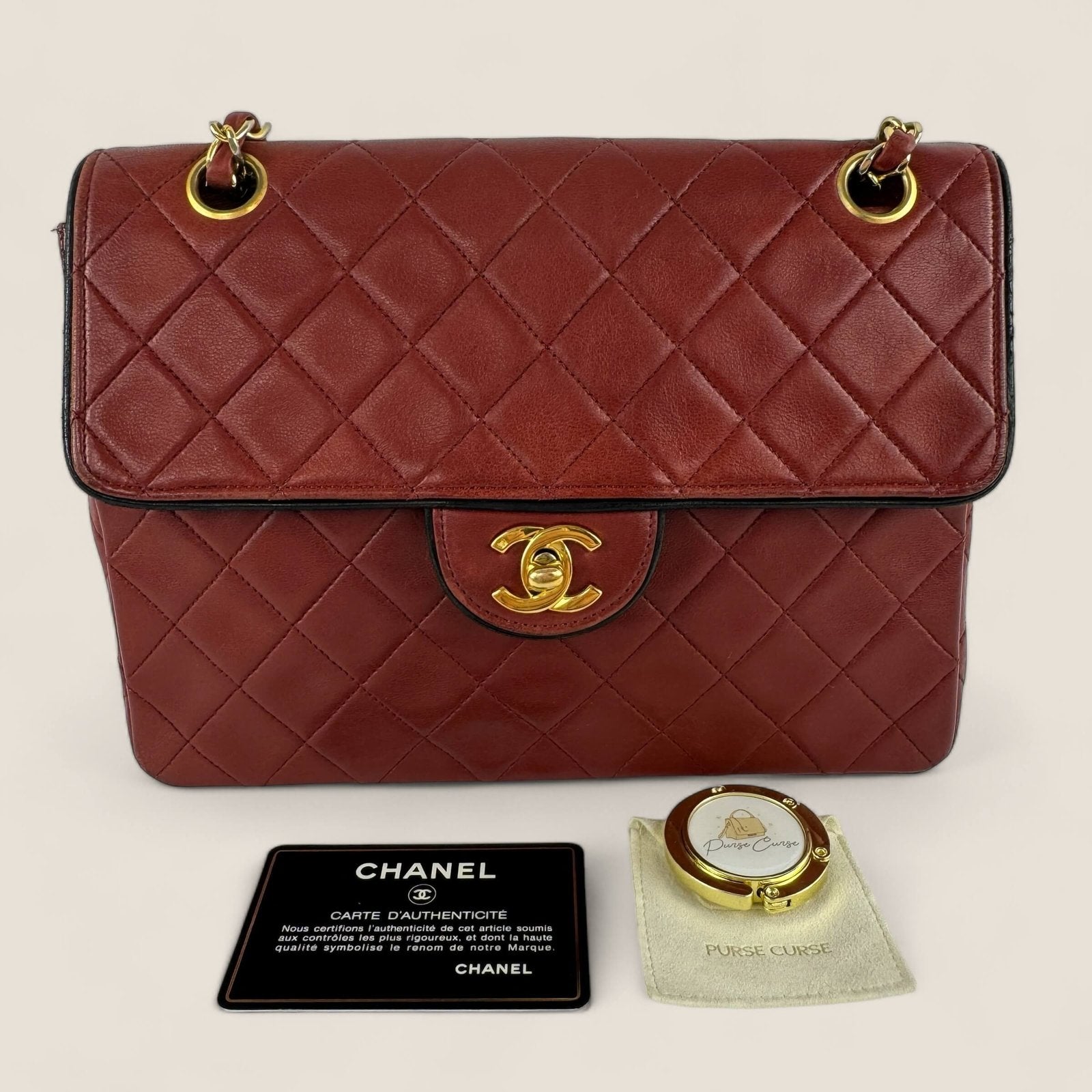 Purse Curse bag holder table preloved Chanel bag