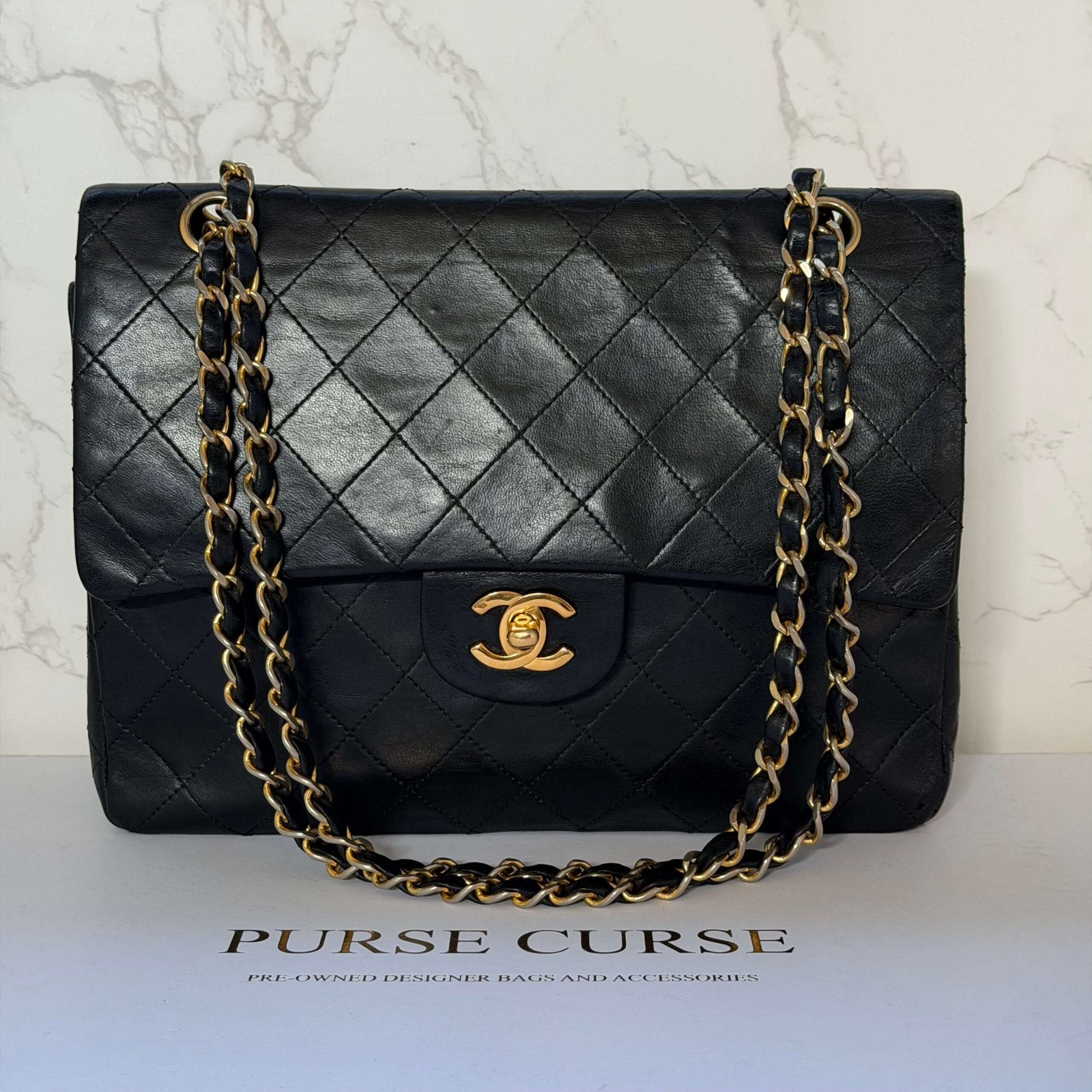 Pre-owned Chanel flap bag in black lambskin