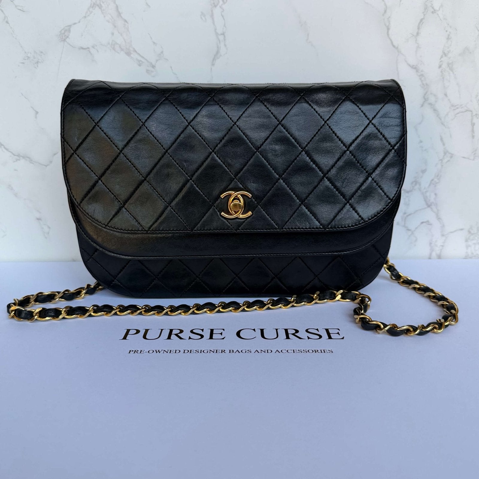 Tweedehands Chanel half moon double flap zwart lamsleer