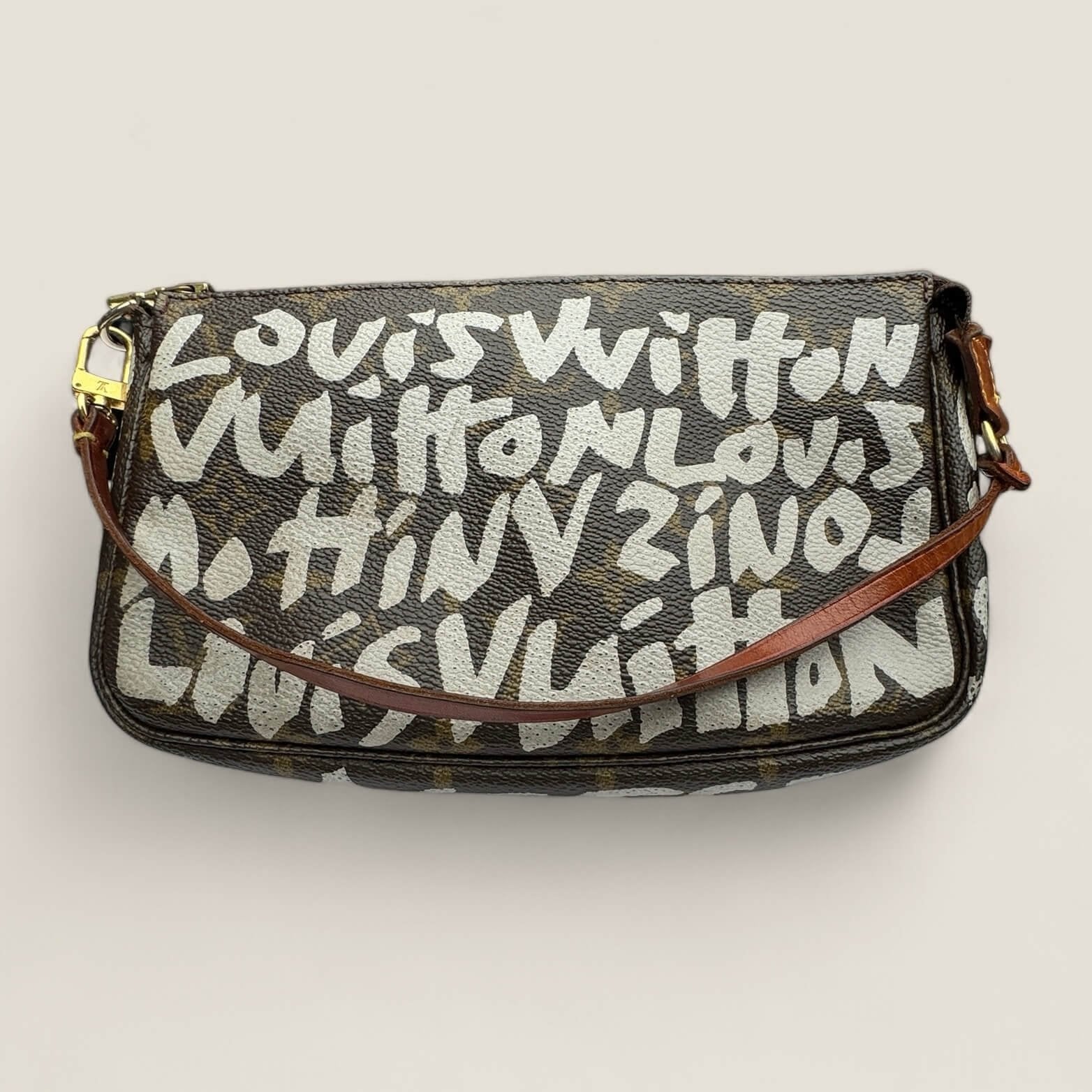 Pre-owned authentic Louis Vuitton pouch