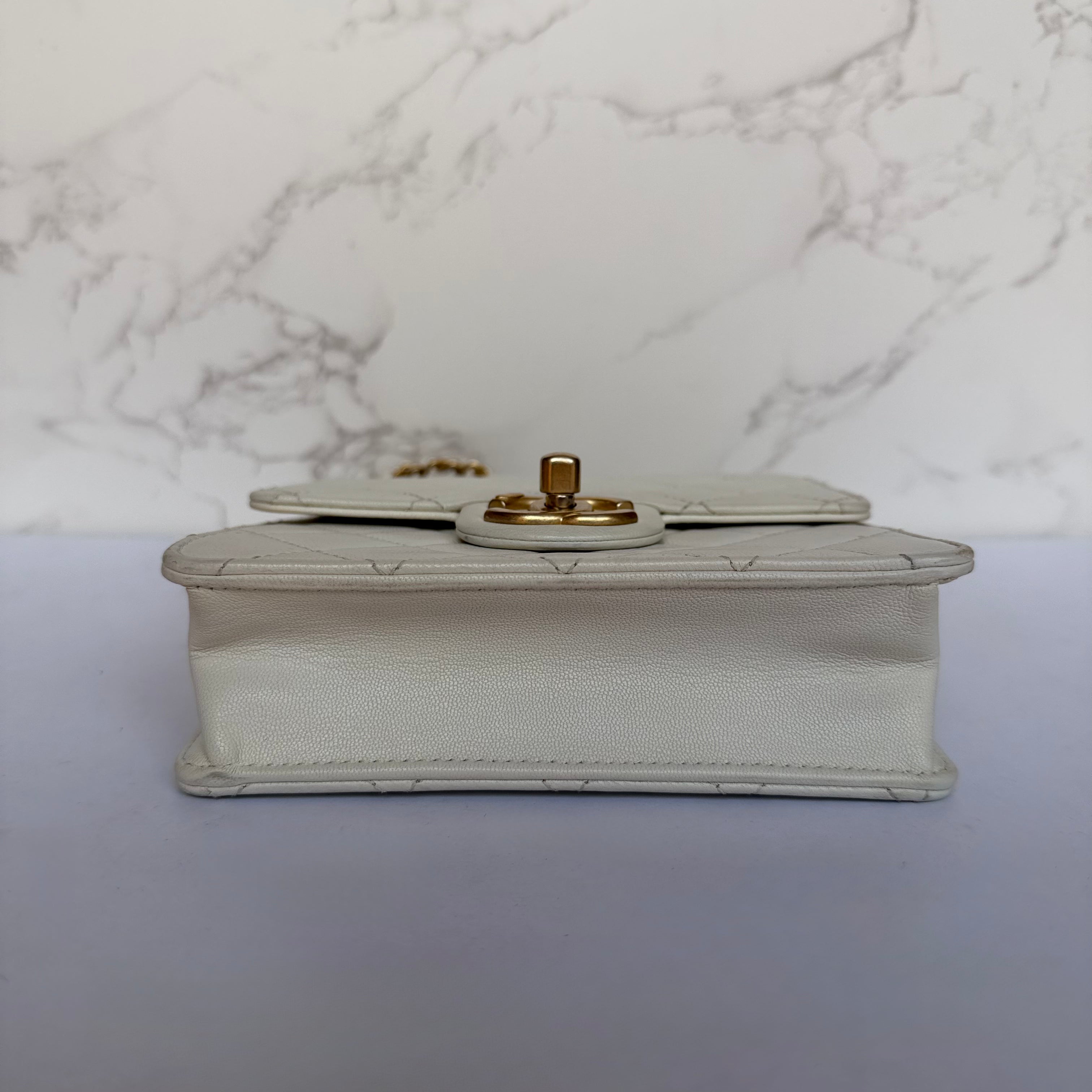 Chanel chic pearl flap bag