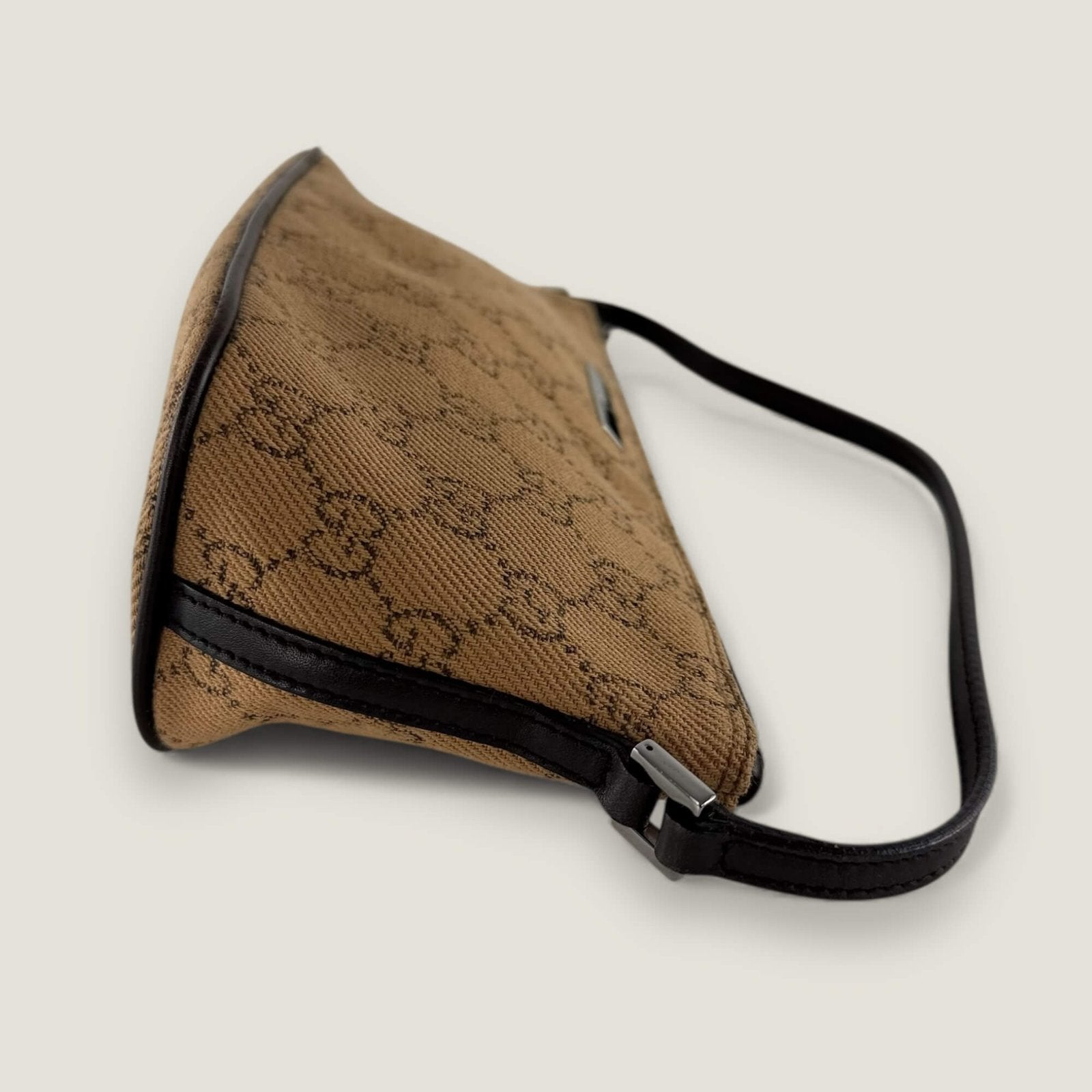 Zijkant authentieke Gucci GG canvas