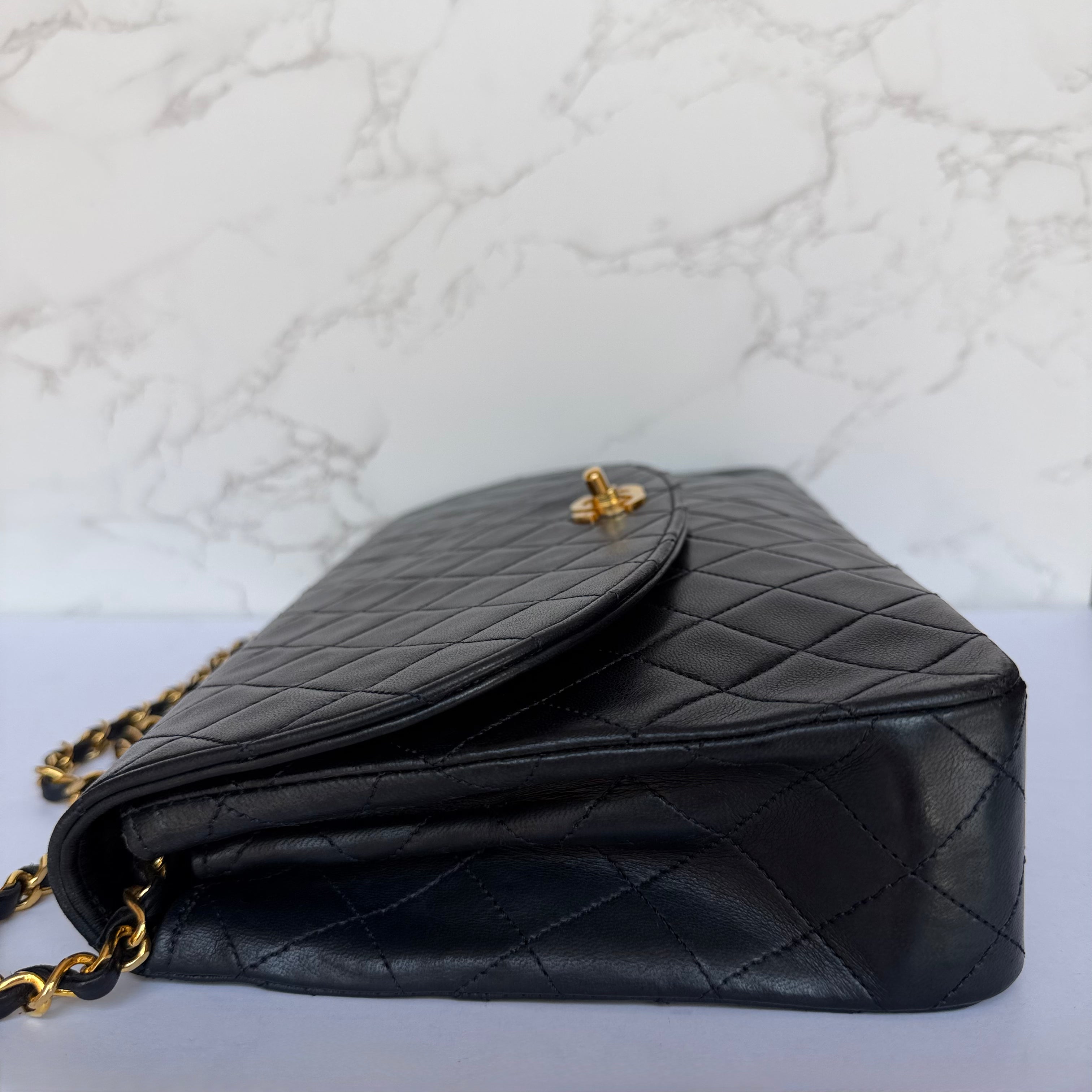 Side of authentic Chanel shoulder bag