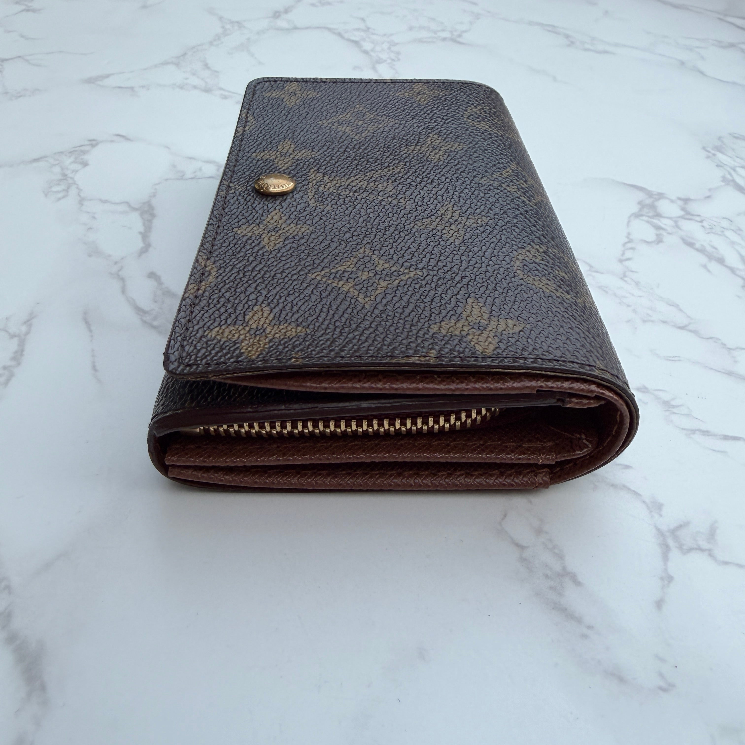 Zijkant authentieke Louis Vuitton portemonnee