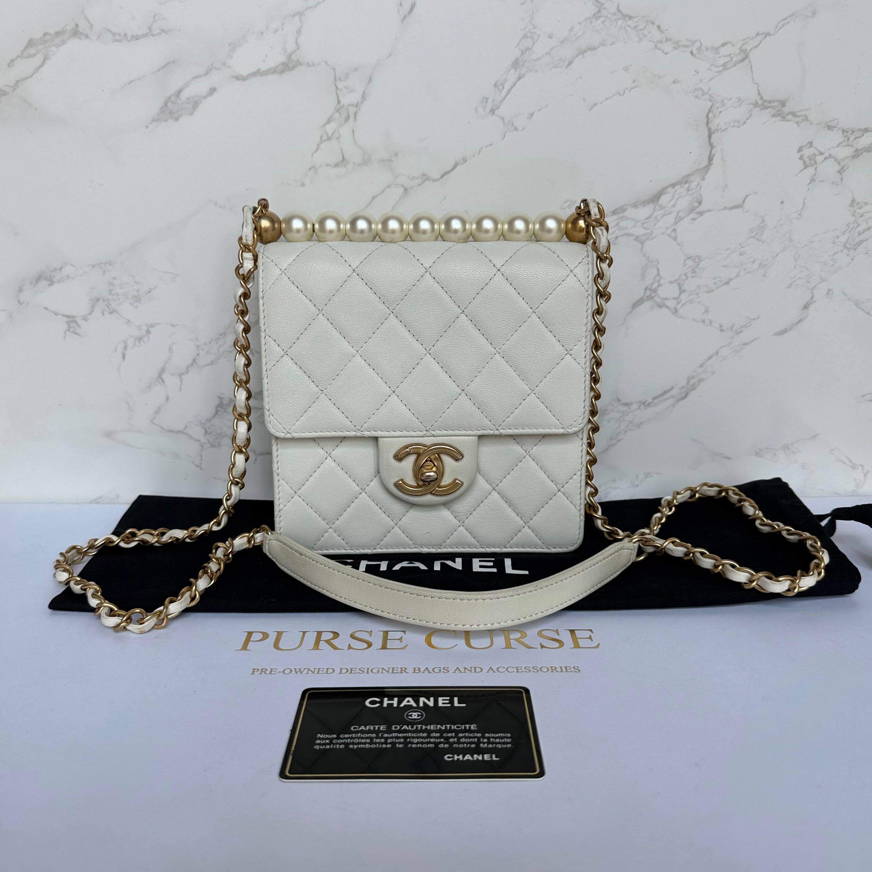 Chanel chic pearl flap bag