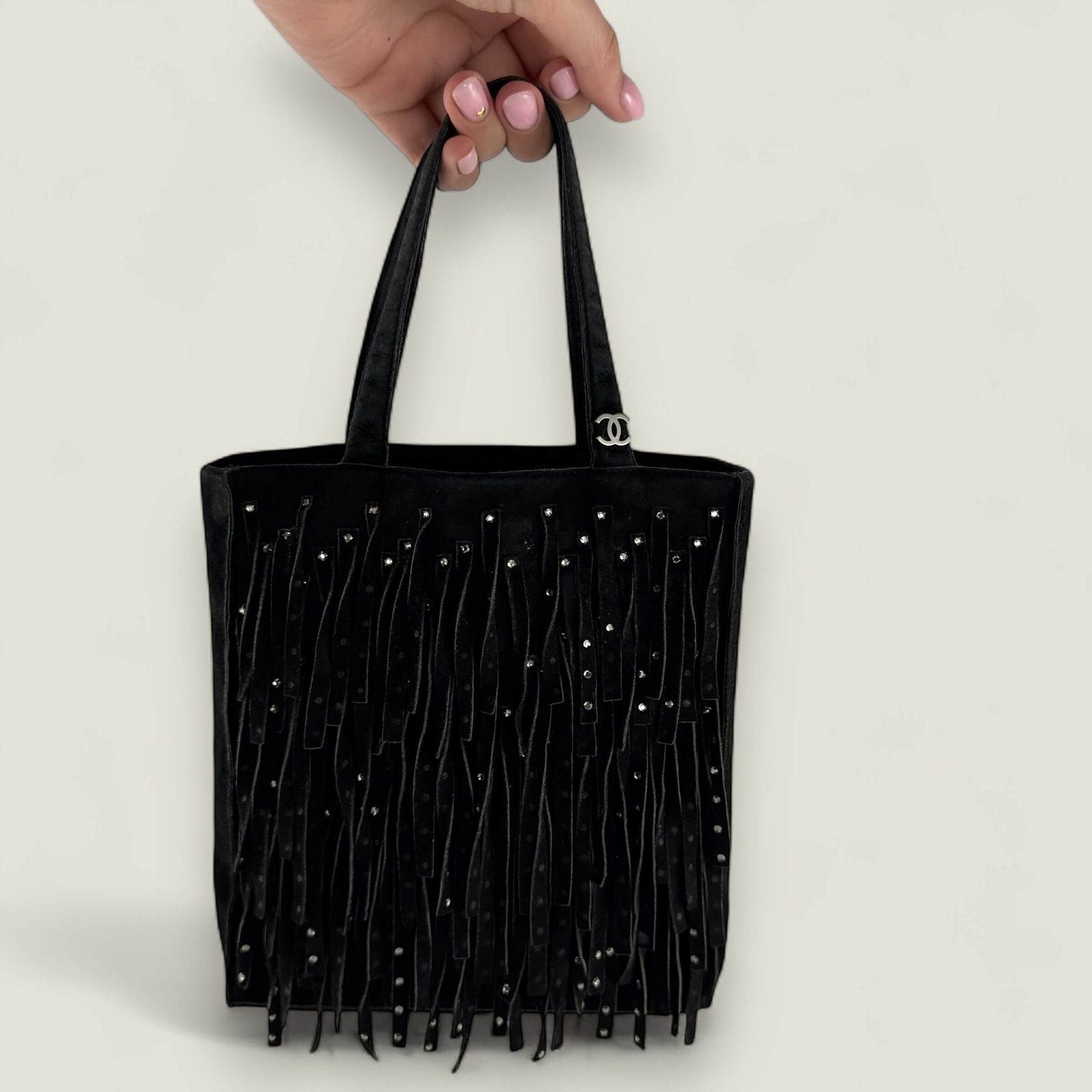pre-owned Chanel bag black suede fringes