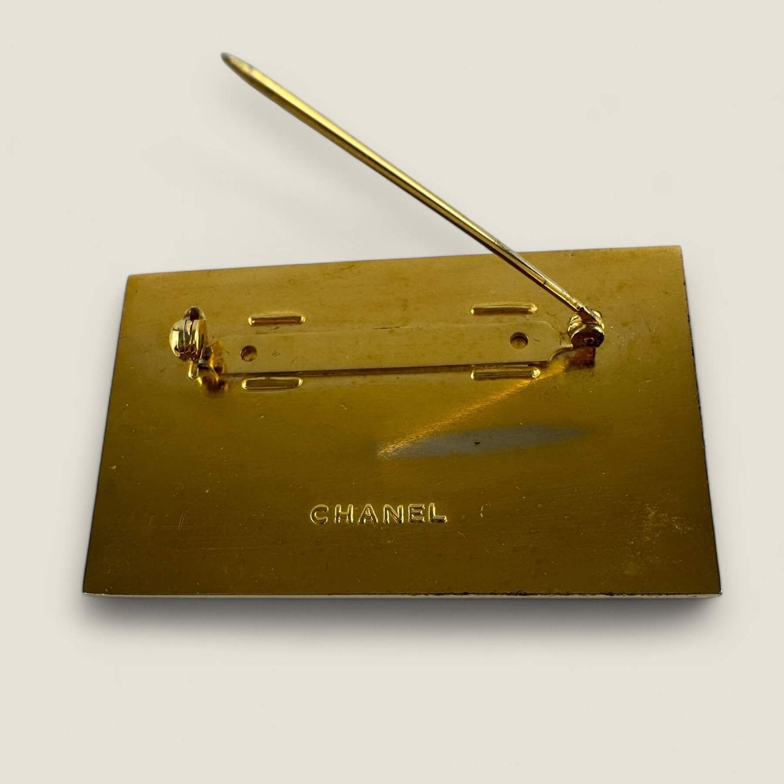 Back Chanel brooch