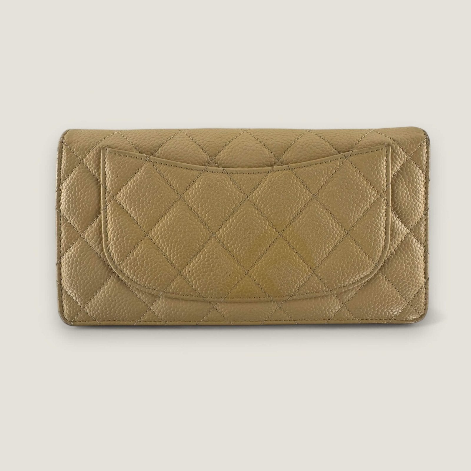 Back of original Chanel wallet in beige caviar leather