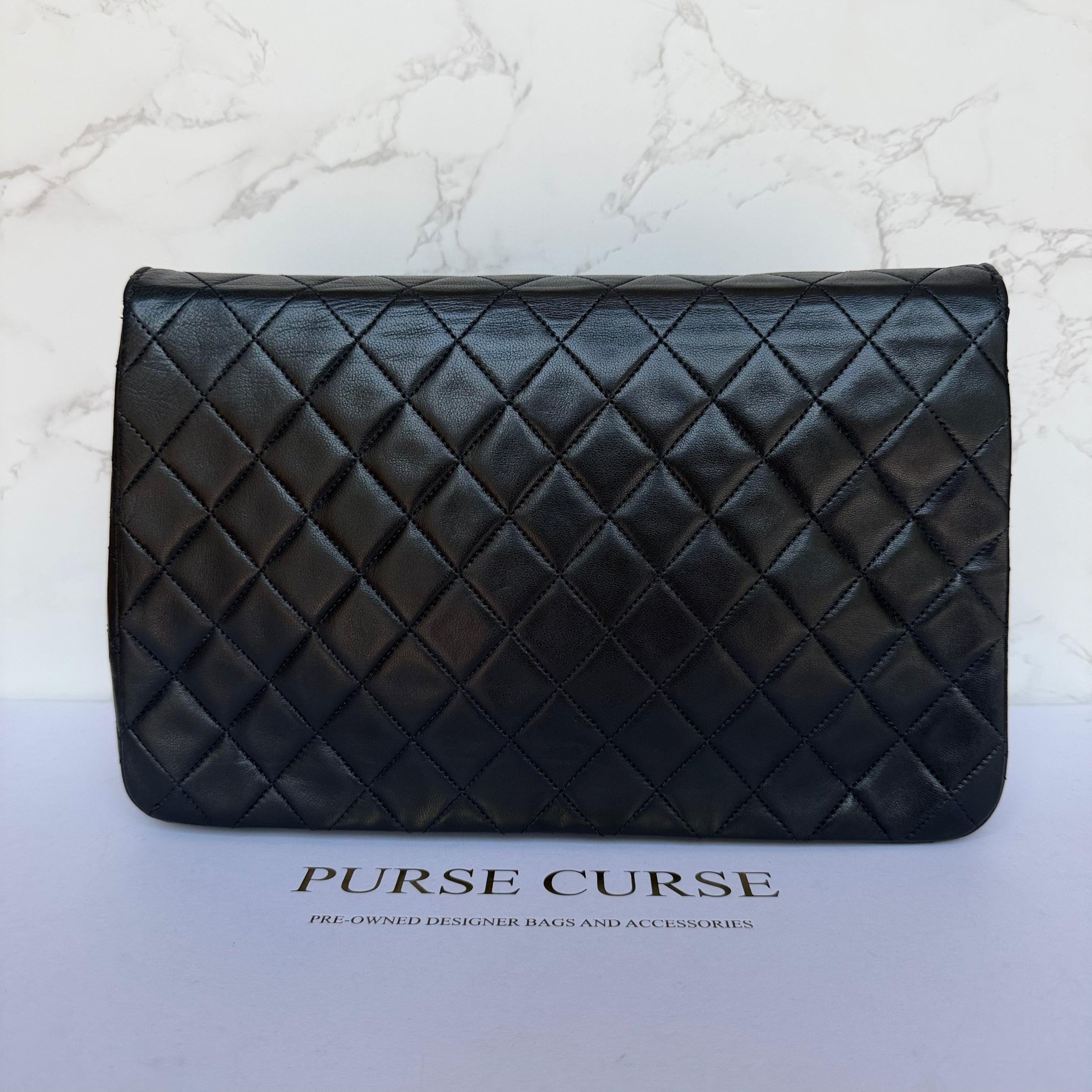 Back of authentic Chanel vintage shoulder bag