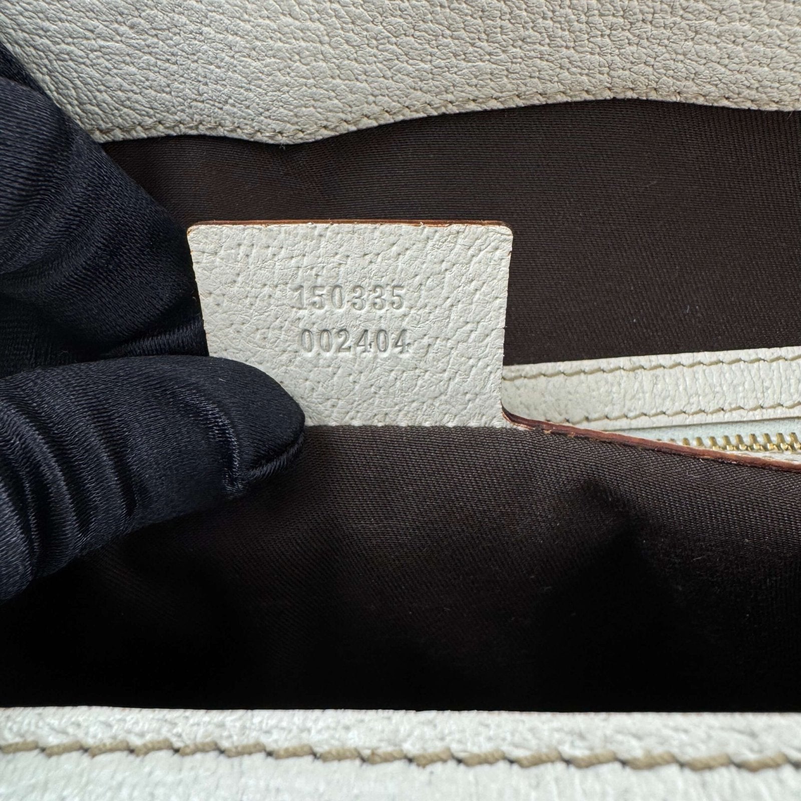 Authentieke Gucci tas serienummer