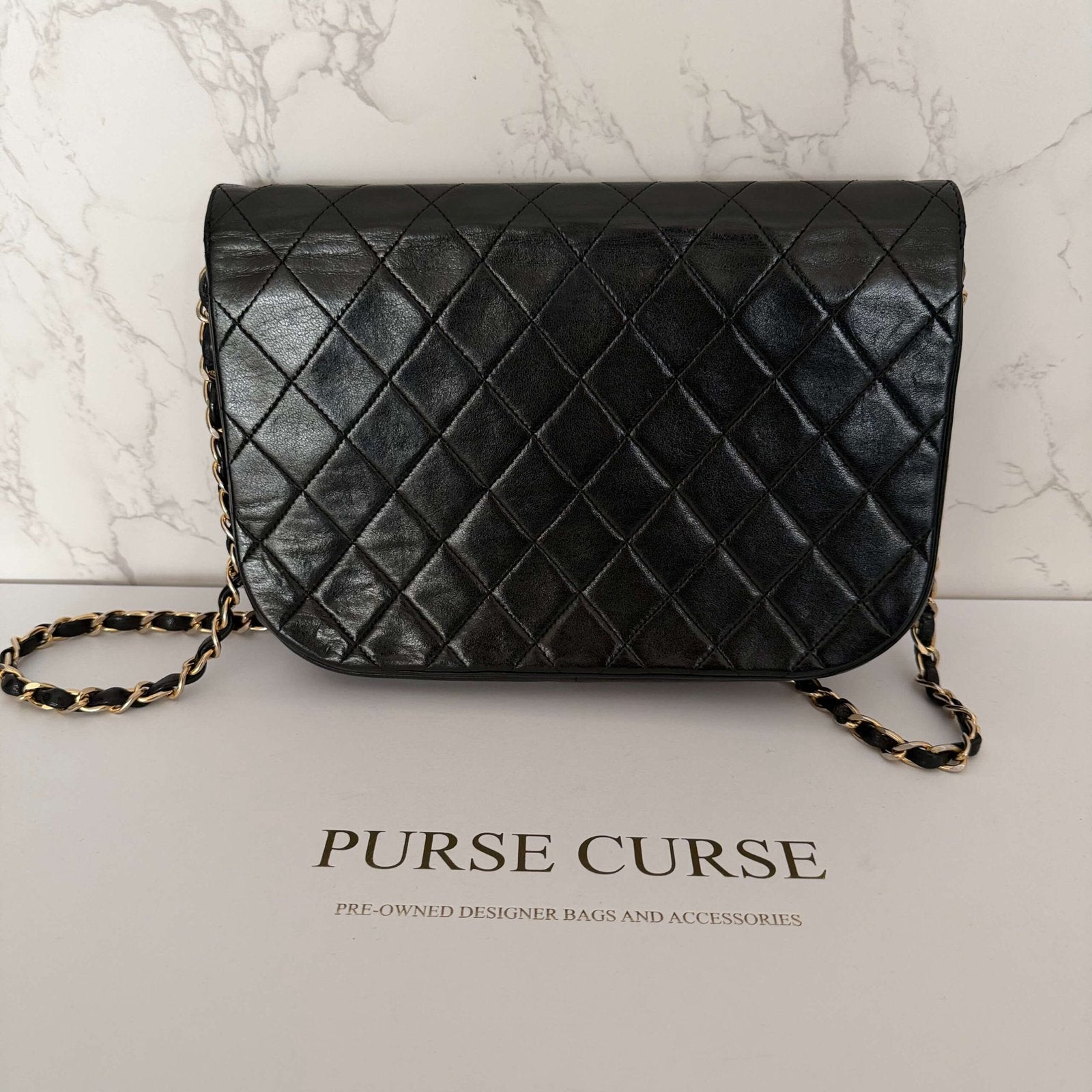Chanel Half Moon bag black quilted