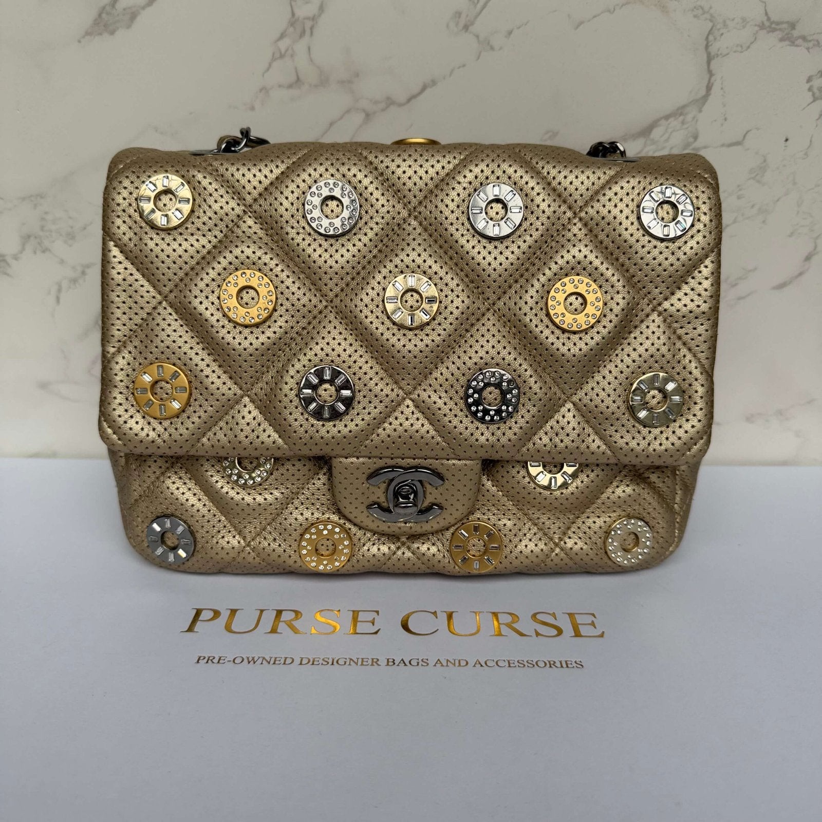 Chanel Paris Dubai metallic medals flap