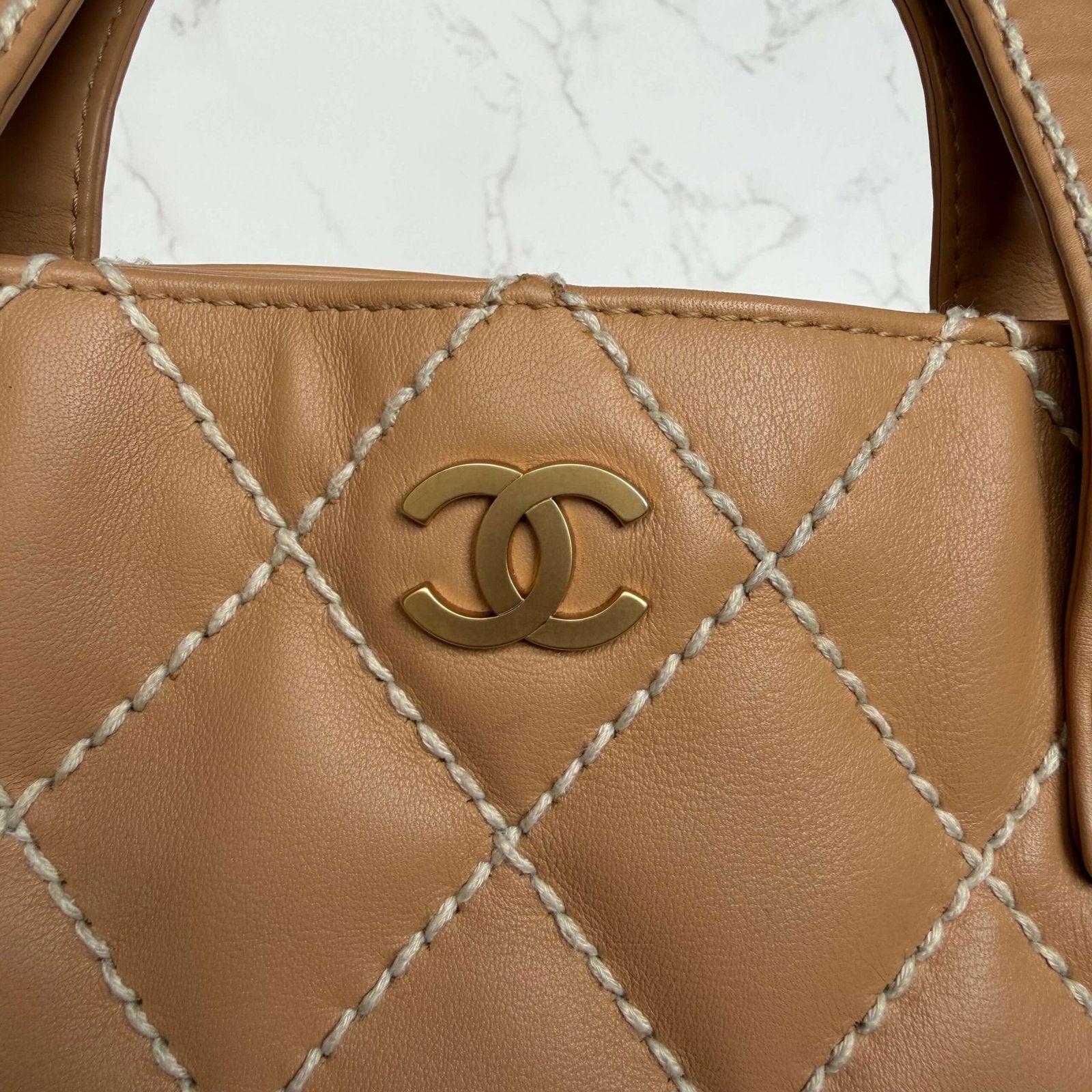 Chanel beige small CC calfskin wild stitch tote hardware goud