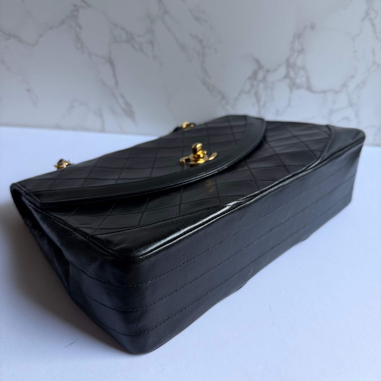 Chanel flap bag black lambskin with gold chain shoulder bag
