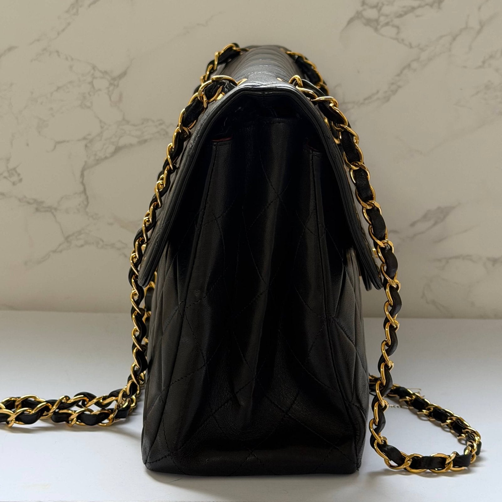 Chanel jumbo flap bag black front CC closure