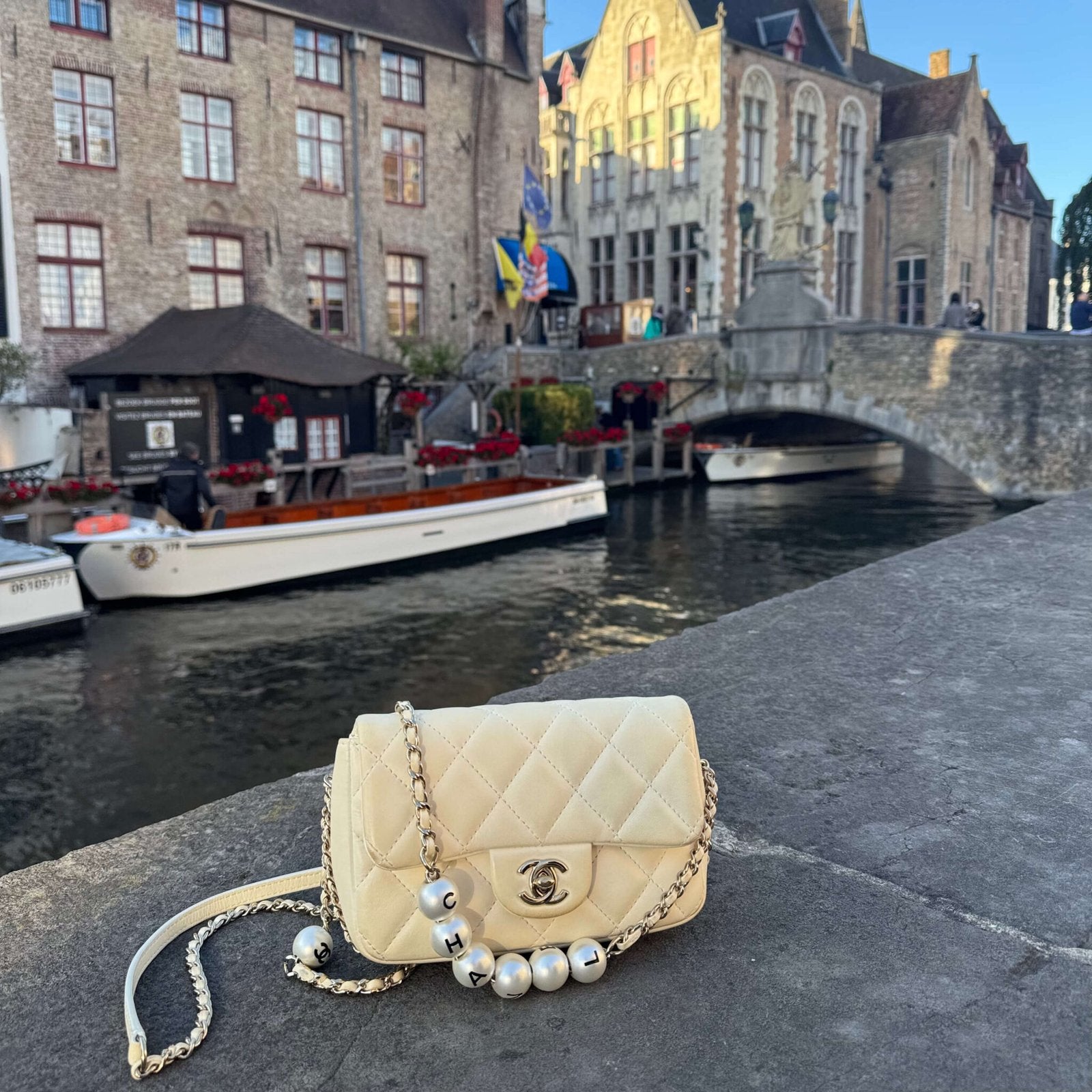 Chanel mini flap with pearl chain Brugge België