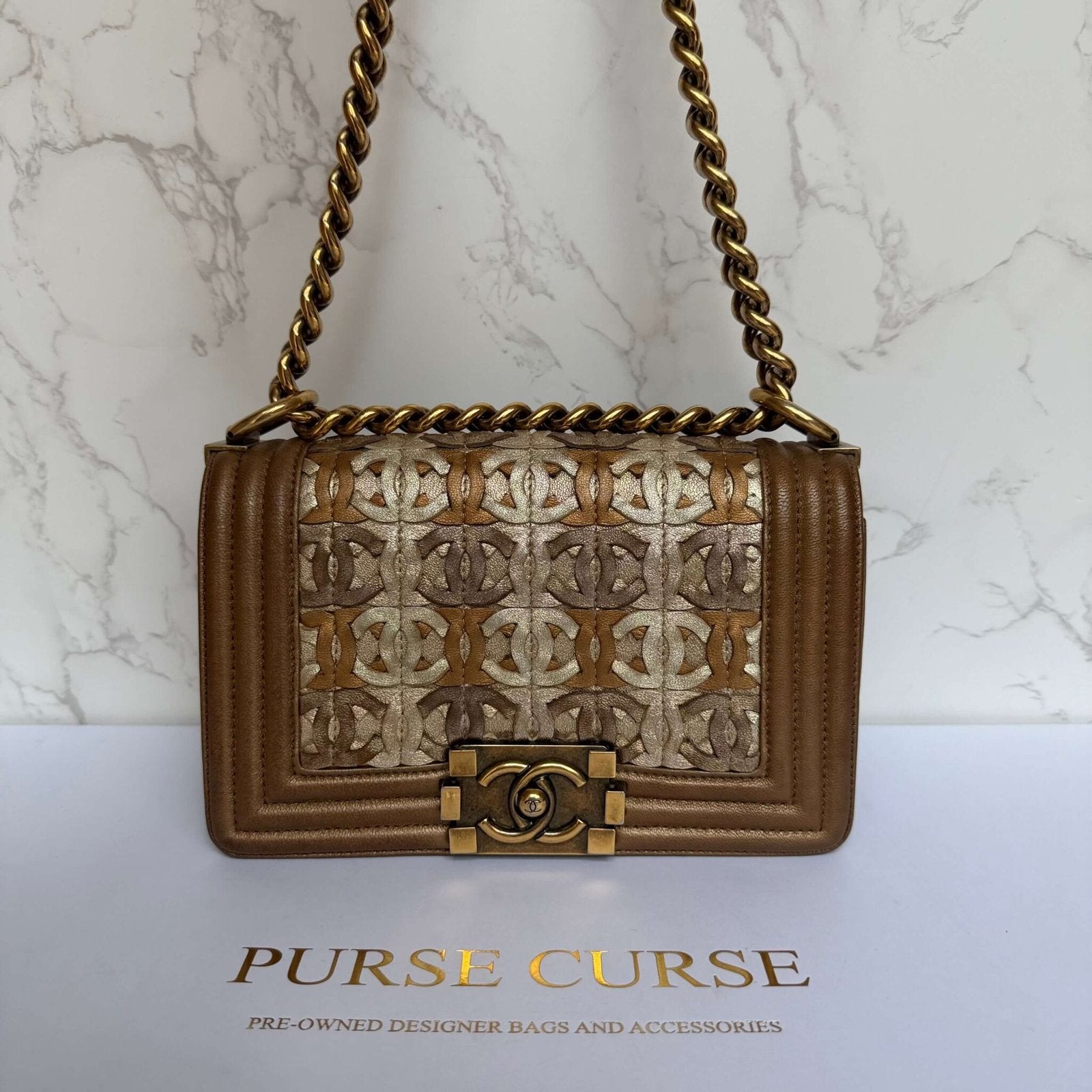 Chanel pre-owned 2014-2015 Small Quilted Metallic Lambskin Interwoven CC Boy Flap crossbody bag